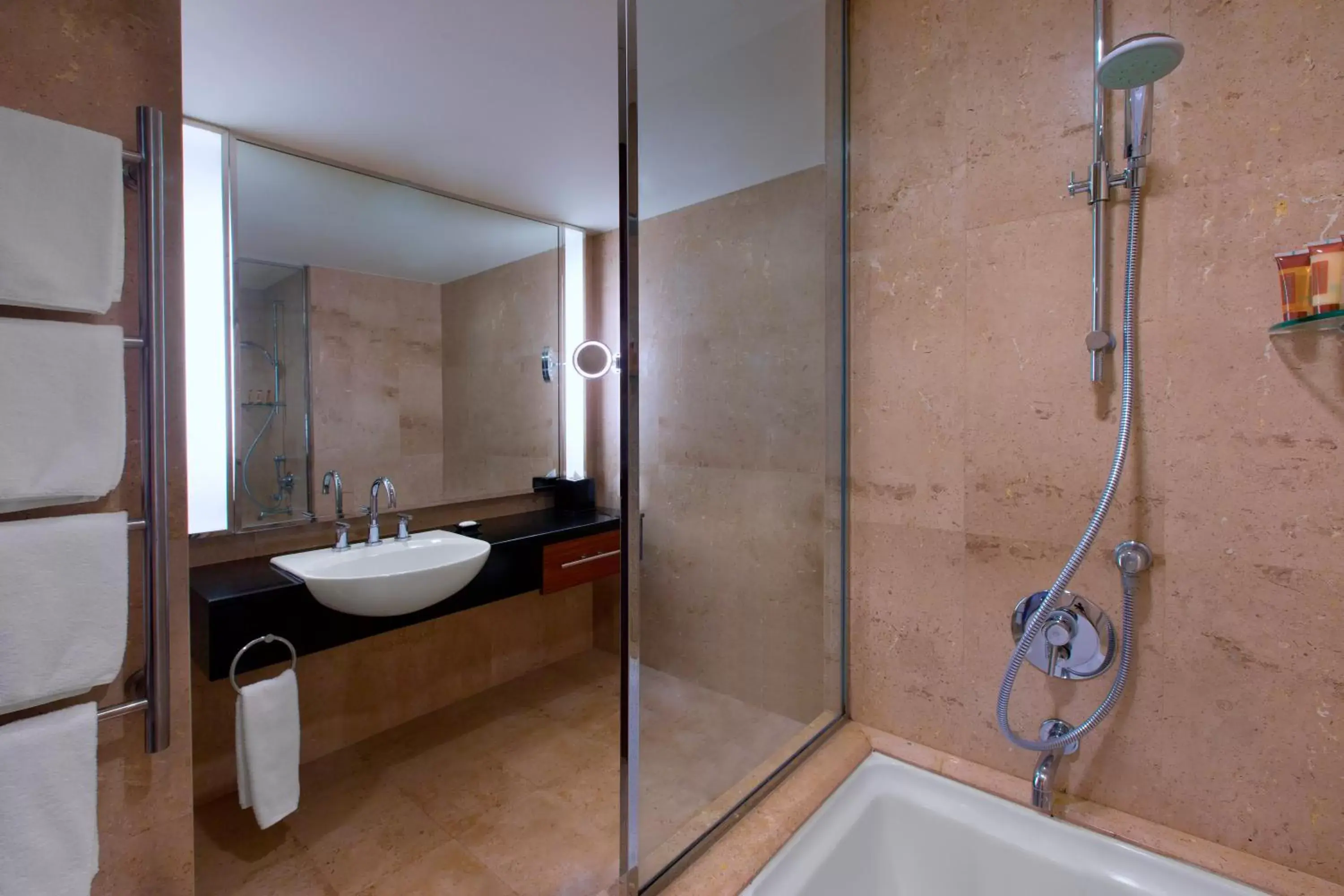 Bathroom in Royal Orchid Sheraton Hotel and Towers
