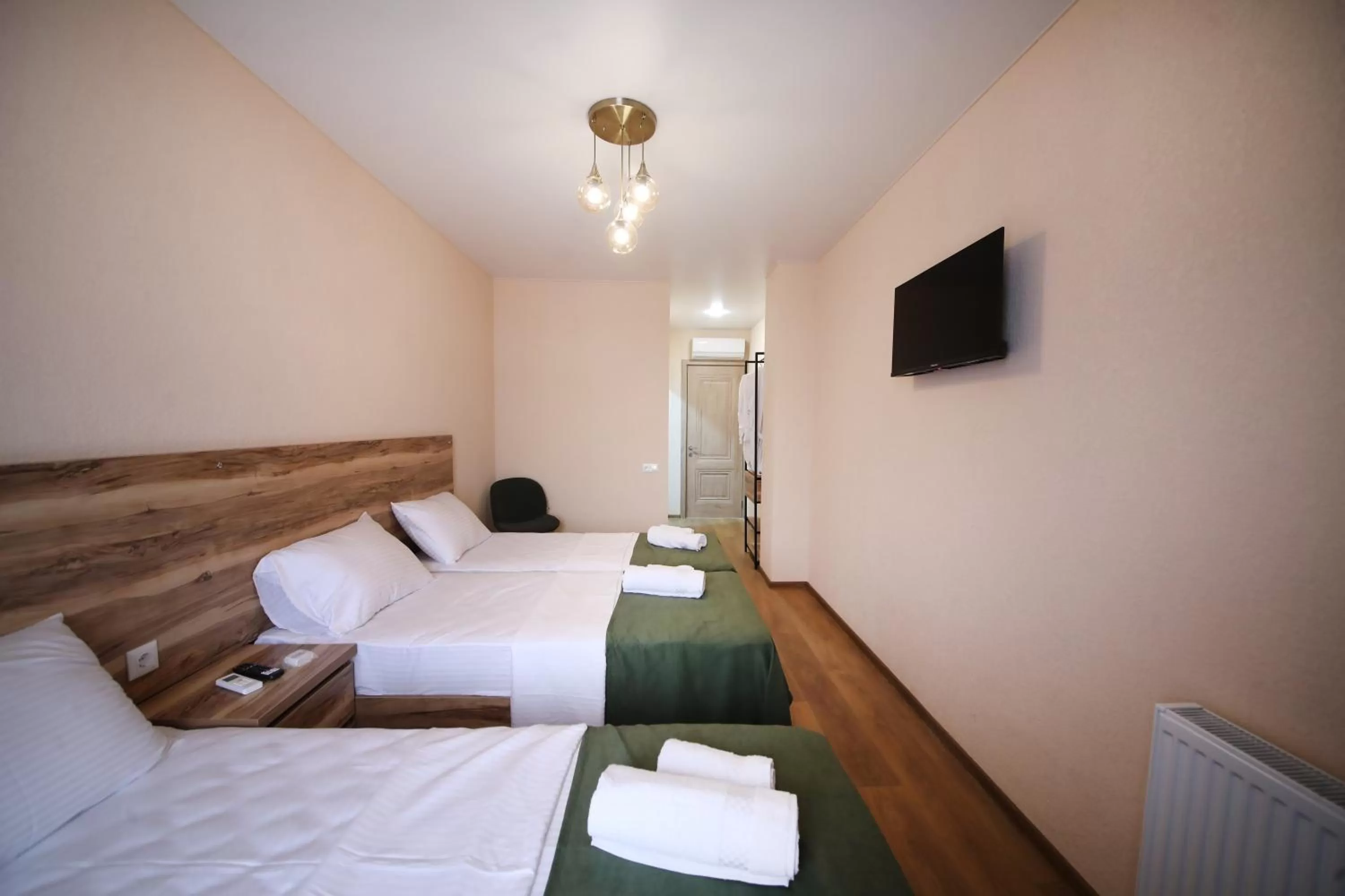 Communal lounge/ TV room, Bed in Bessarion Boutique Hotel