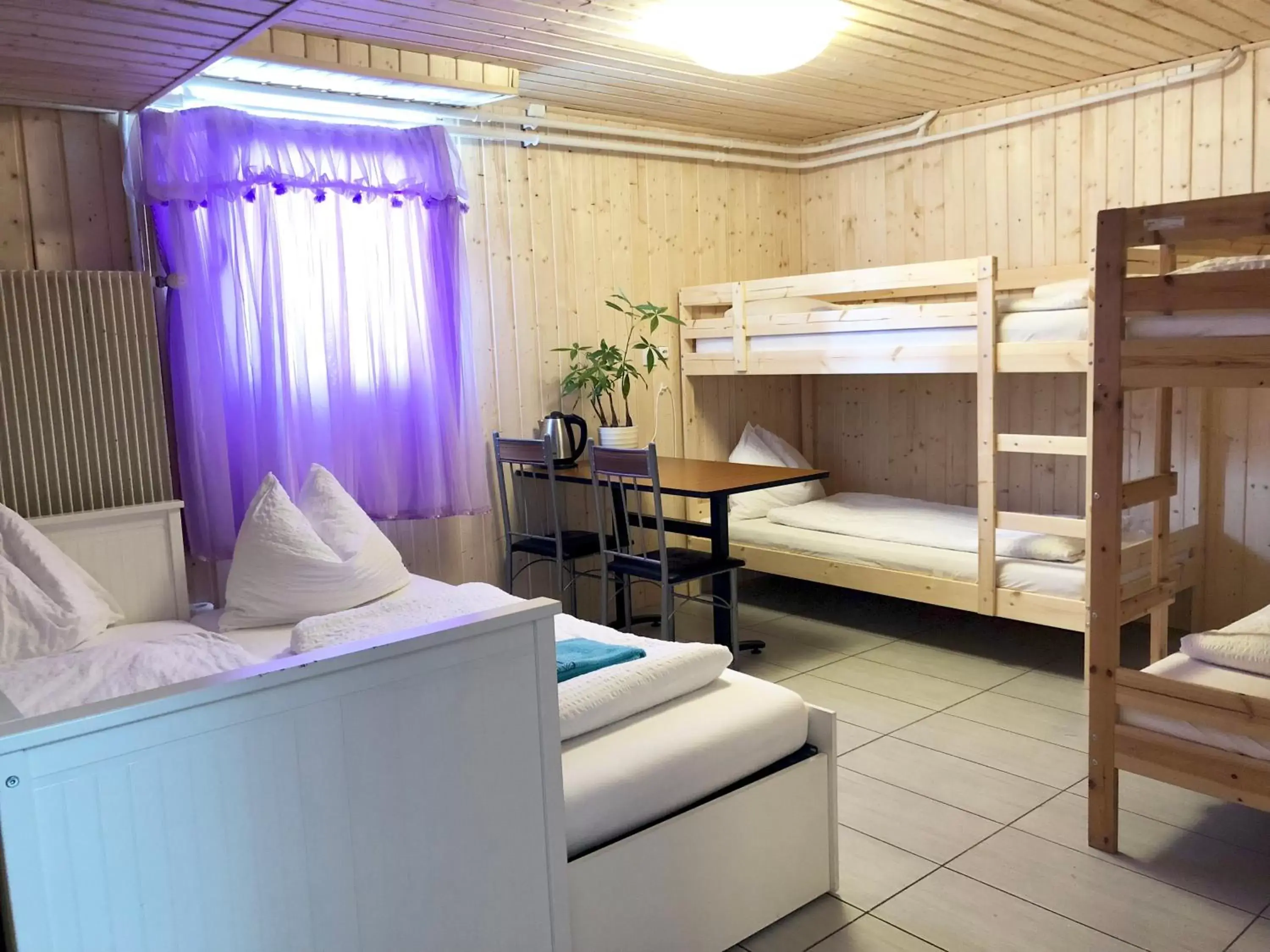 Sextuple Room with Shared Bathroom in Interlaken Marco Hostel