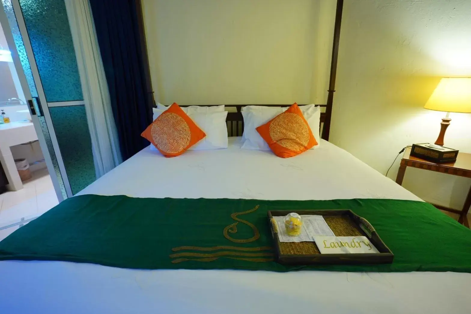 Bed in Supatra Hua Hin Resort