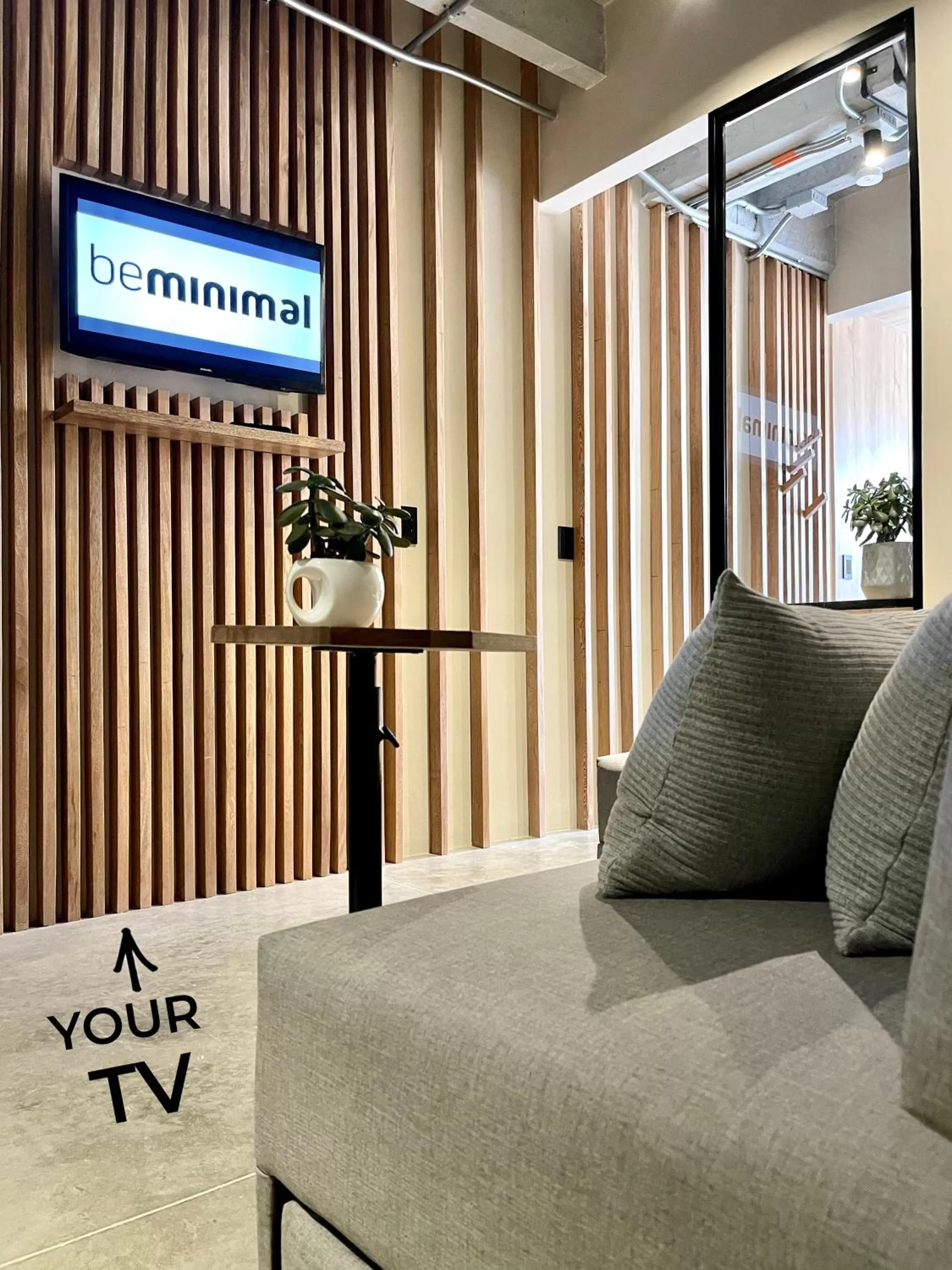 Communal lounge/ TV room in Beminimal Hotel