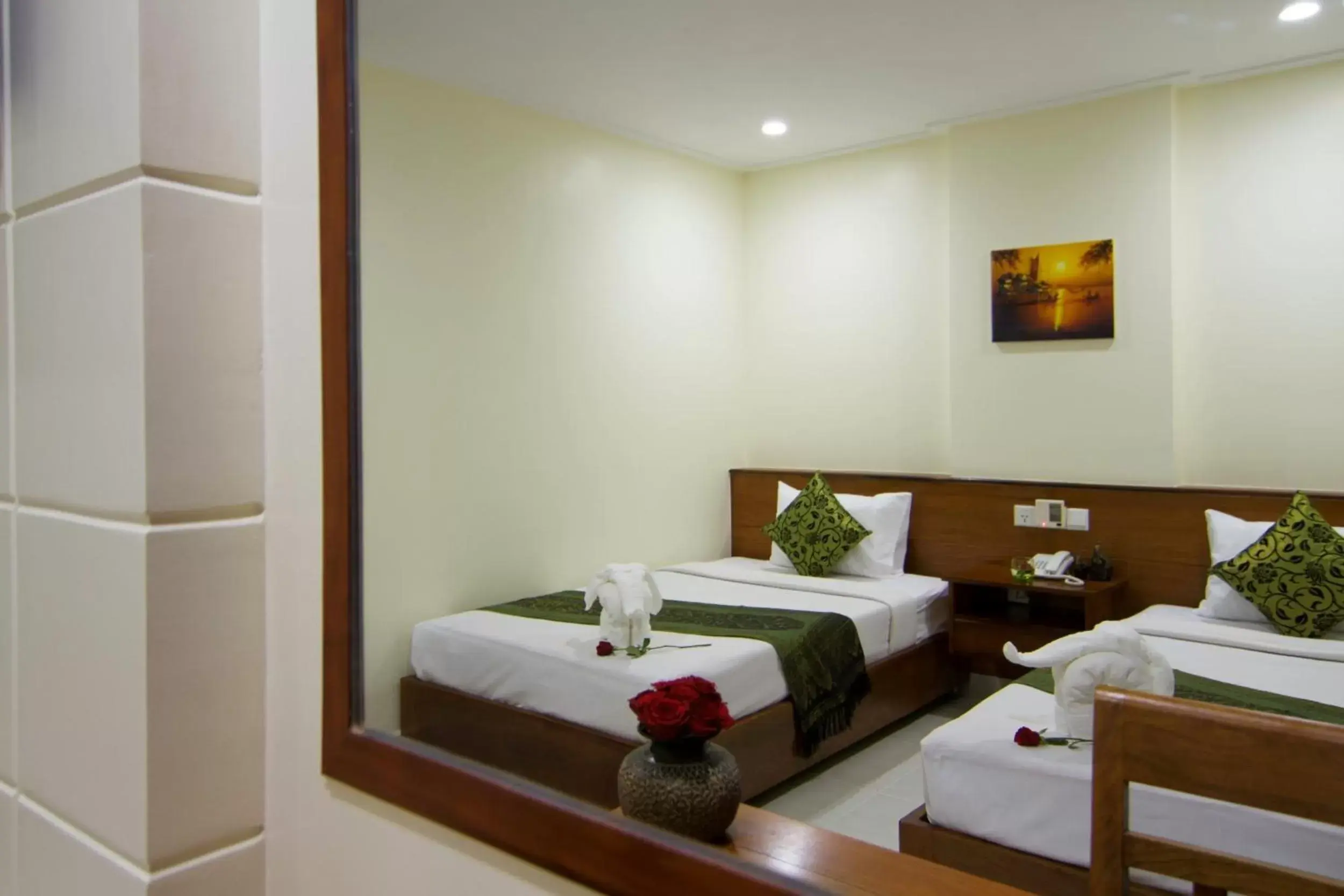 Bed in Rose Emerald Hotel