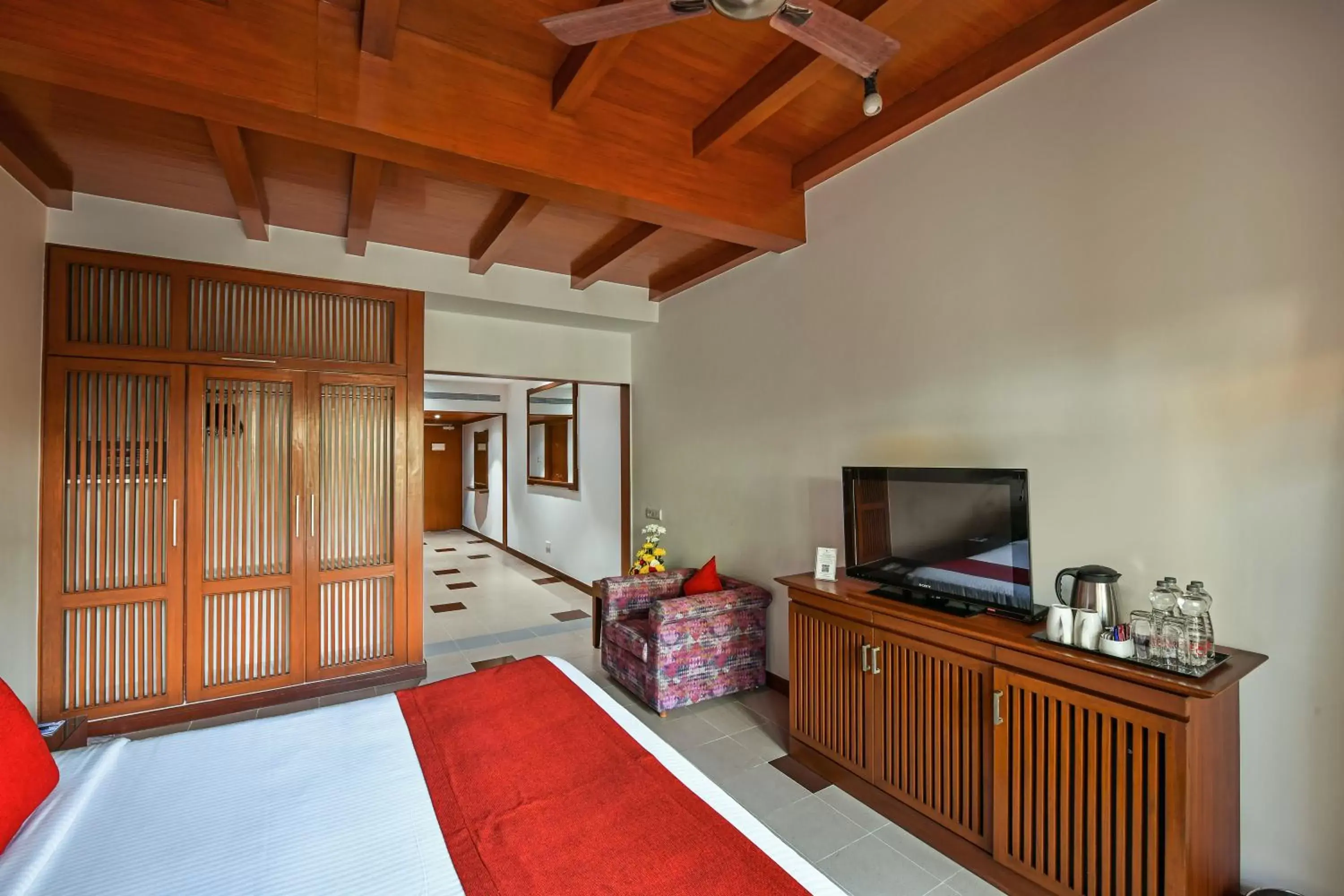 Bedroom, TV/Entertainment Center in Fariyas Resort Lonavala