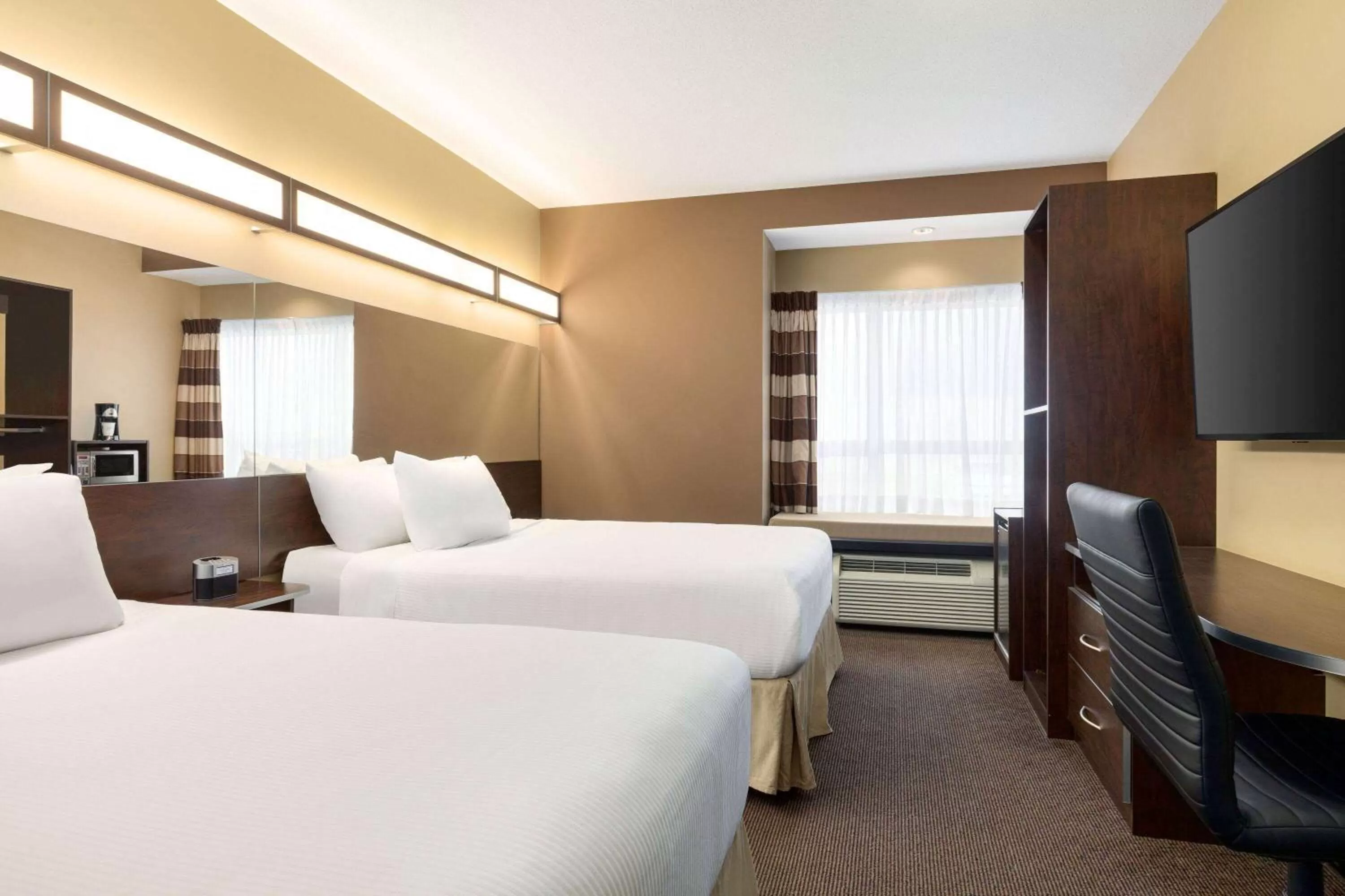 Photo of the whole room, Bed in Microtel Inn & Suites by Wyndham Estevan