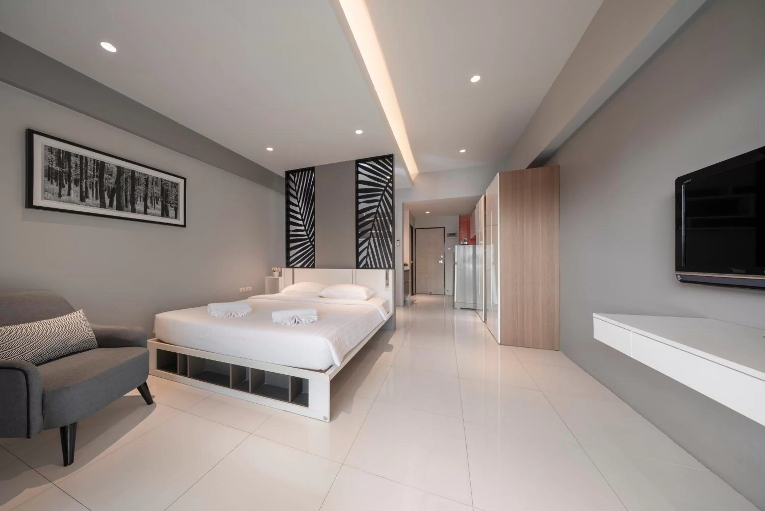 Bed in At 115 Hotel By Rompo