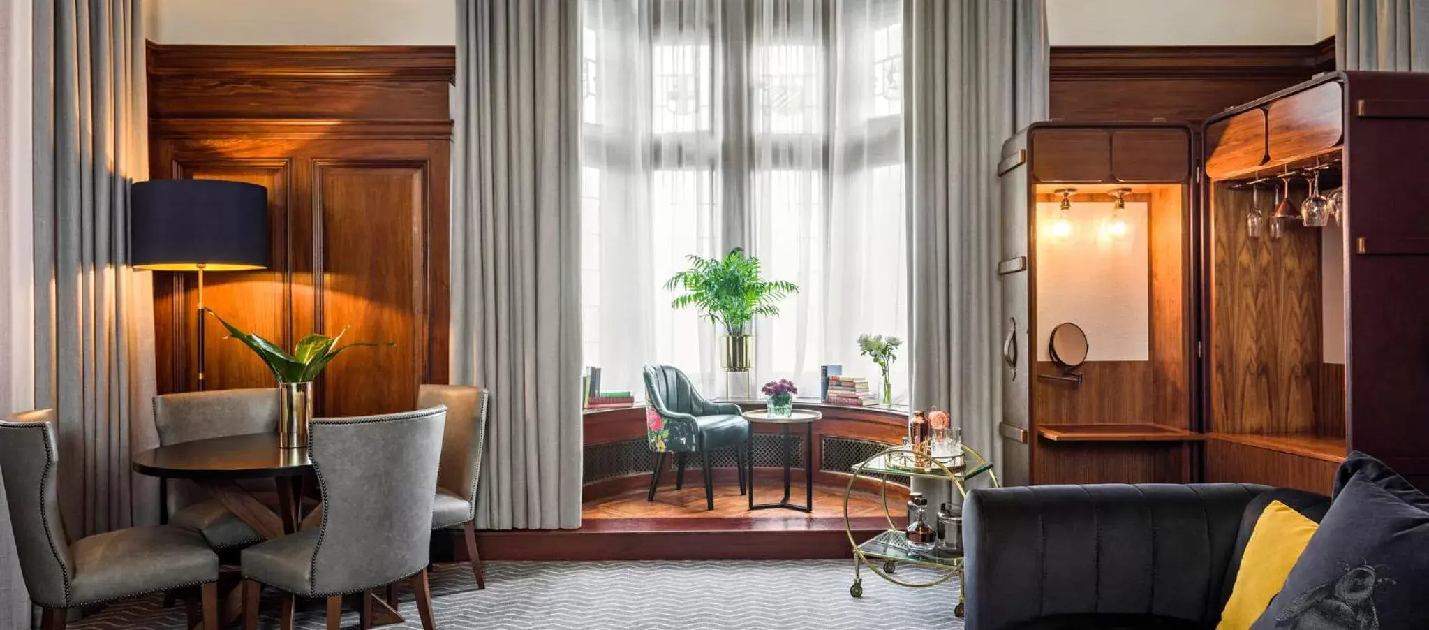 Photo of the whole room, Seating Area in Kimpton Clocktower, an IHG Hotel