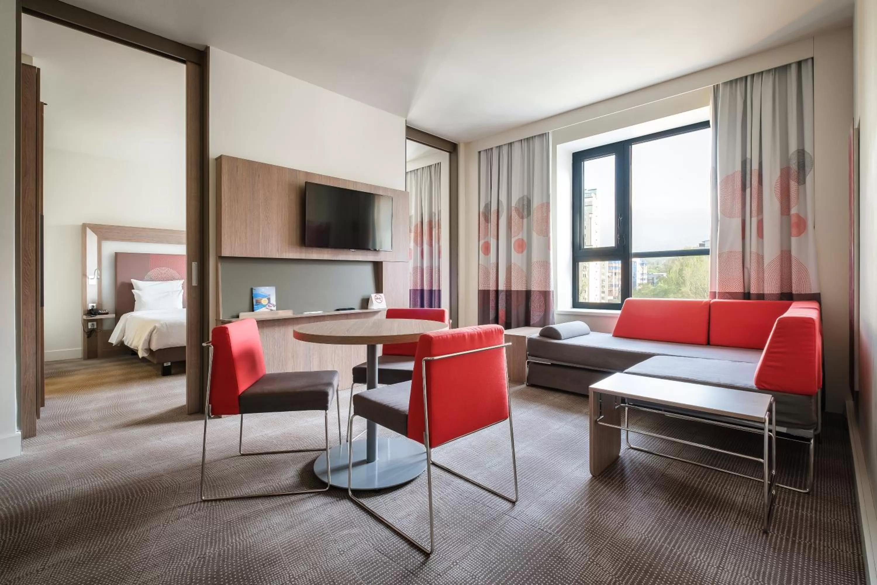 Seating area, Bed in Novotel Almaty City Center