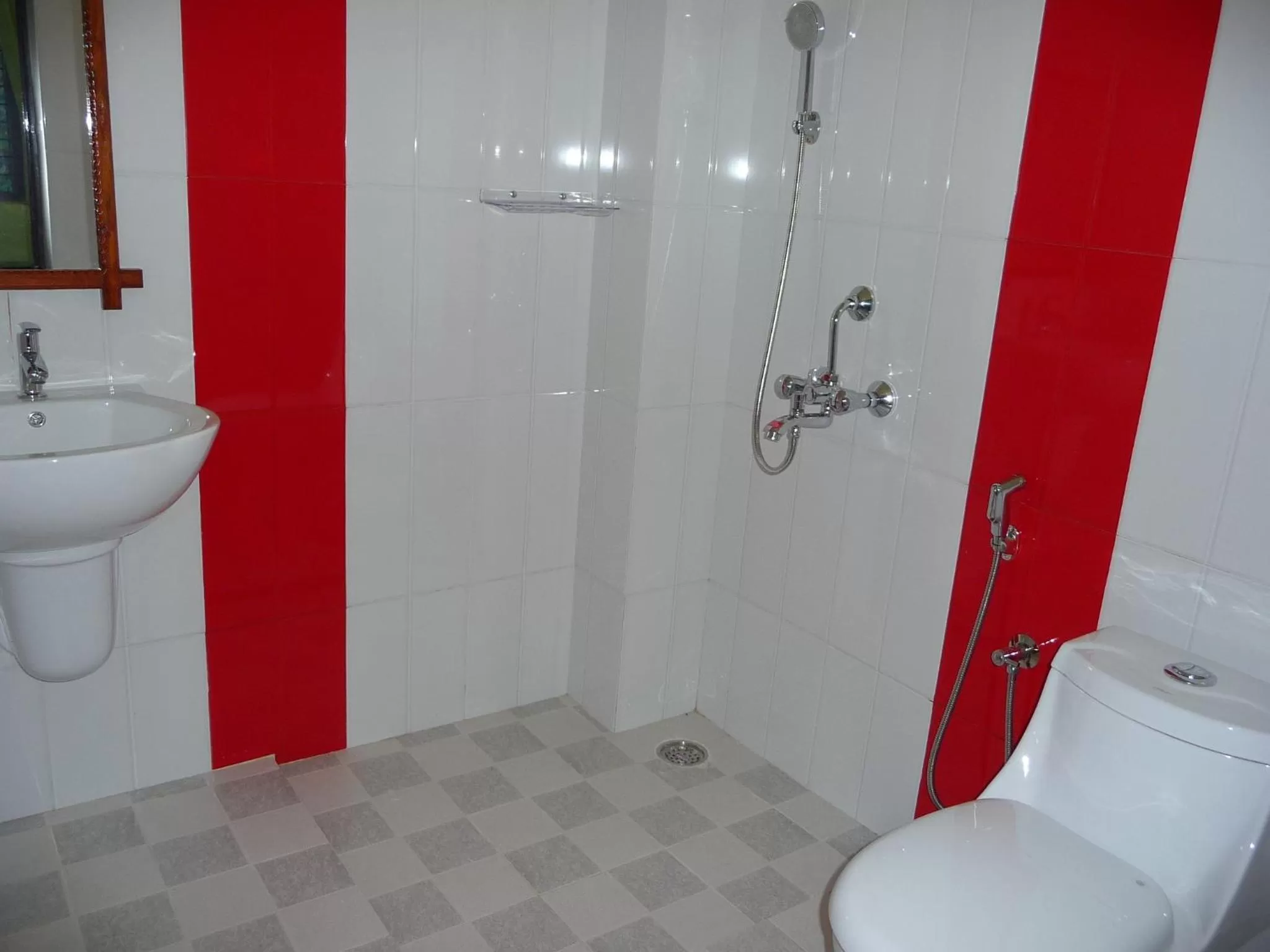Shower in Ganesh Ayurveda Holiday Home