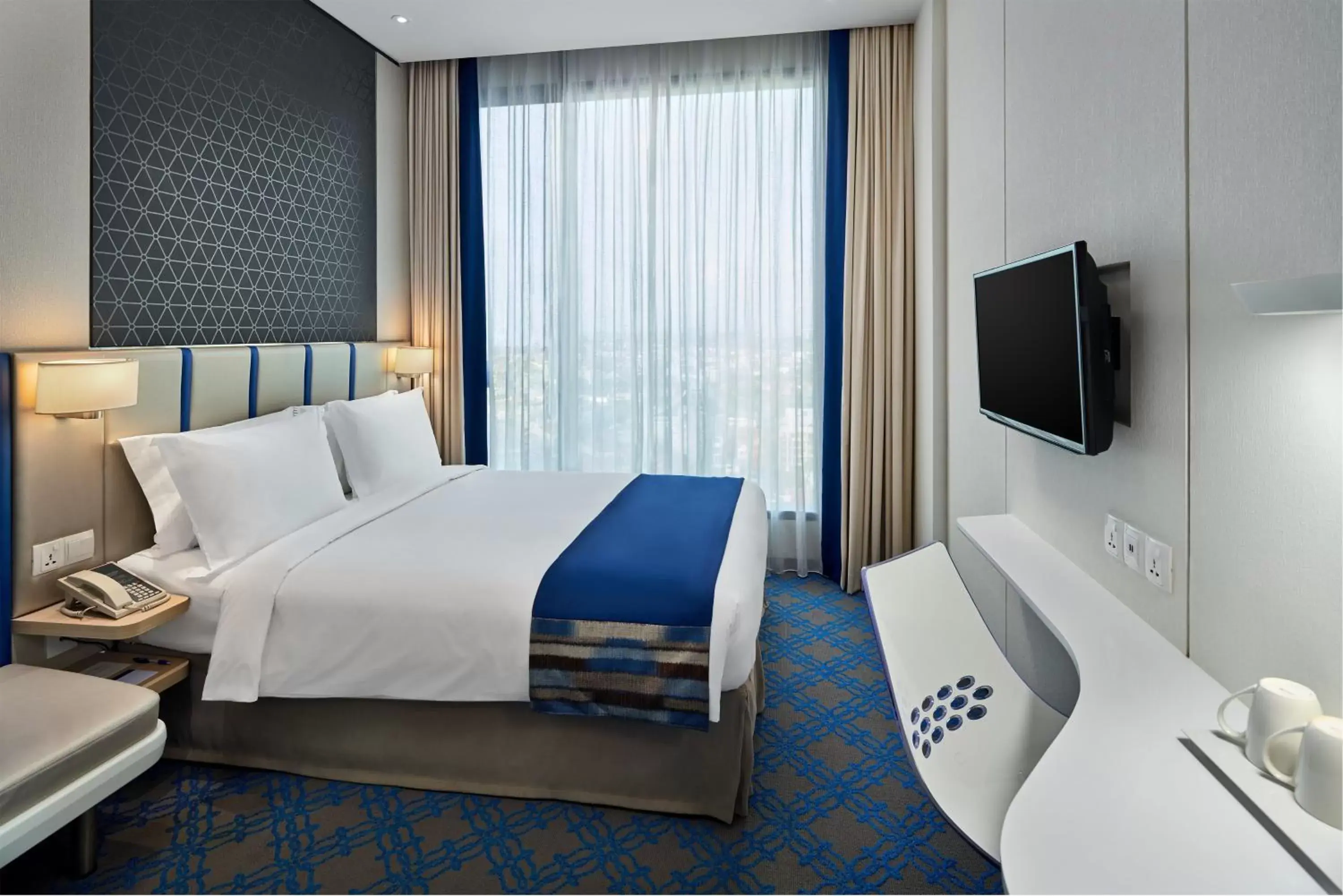 Photo of the whole room, Bed in Holiday Inn Express Singapore Katong, an IHG Hotel