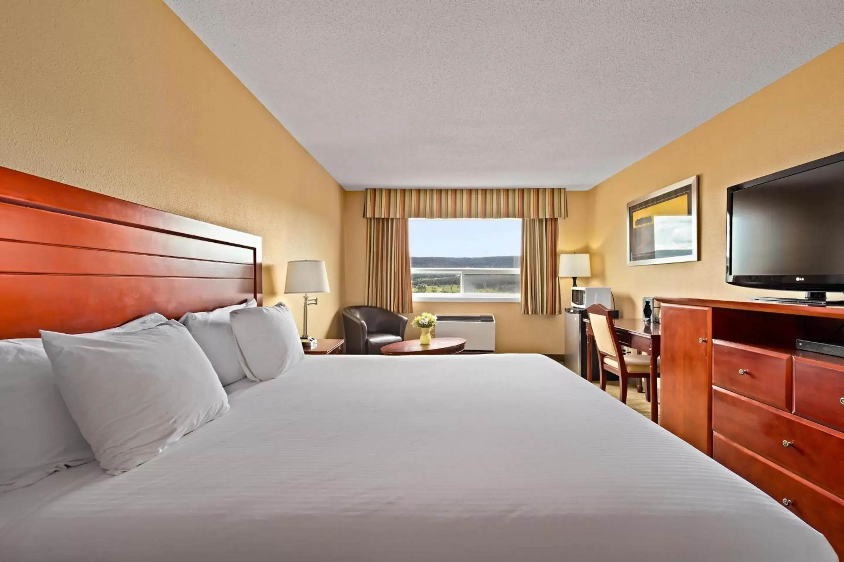 Bedroom in Coast Fraser Inn