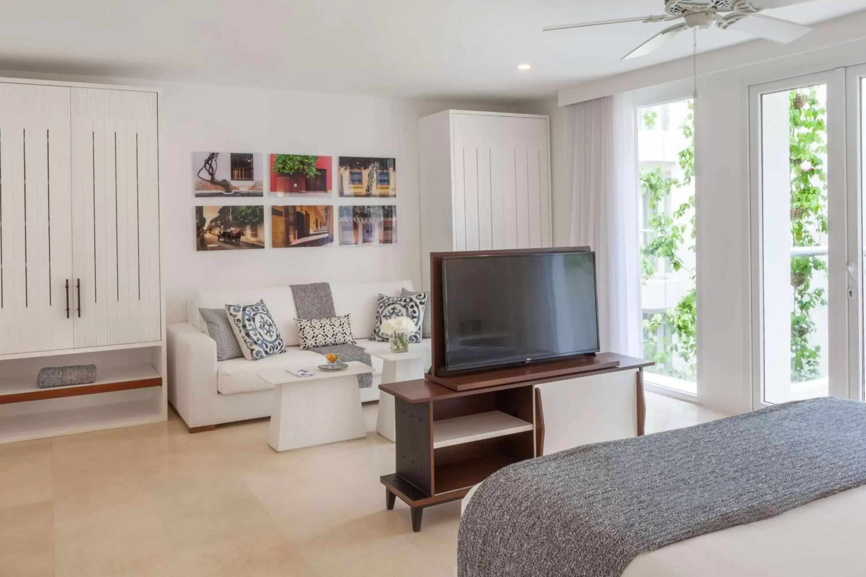 Living room, TV/Entertainment Center in Nacar Hotel Cartagena, Curio Collection by Hilton