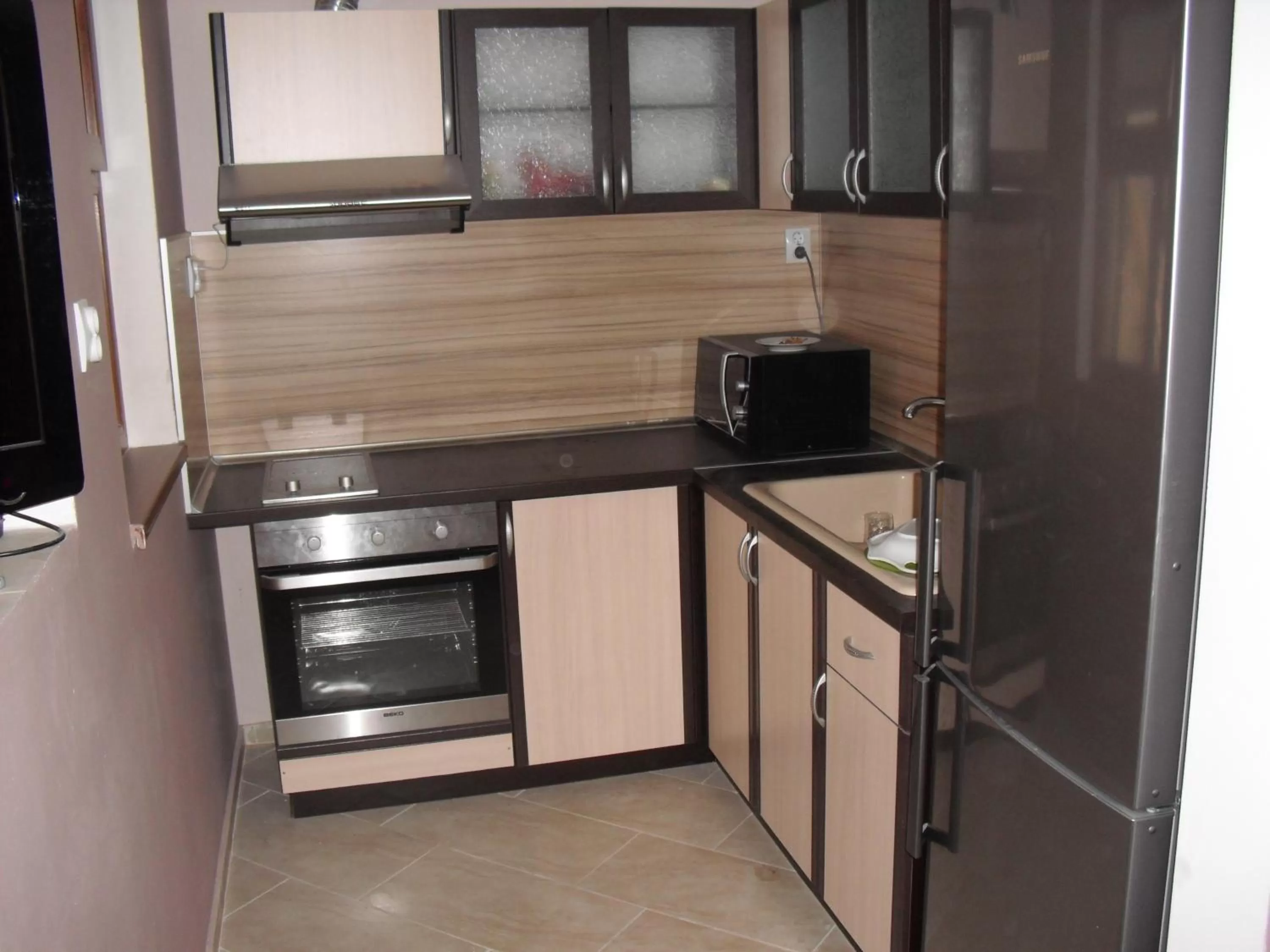 Kitchen or kitchenette in Family Hotel Malibu