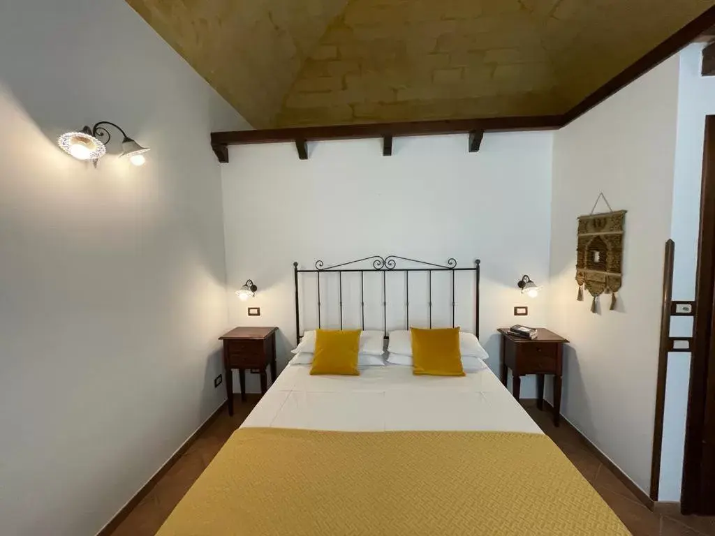 Bed in Ai Dammusi Rooms