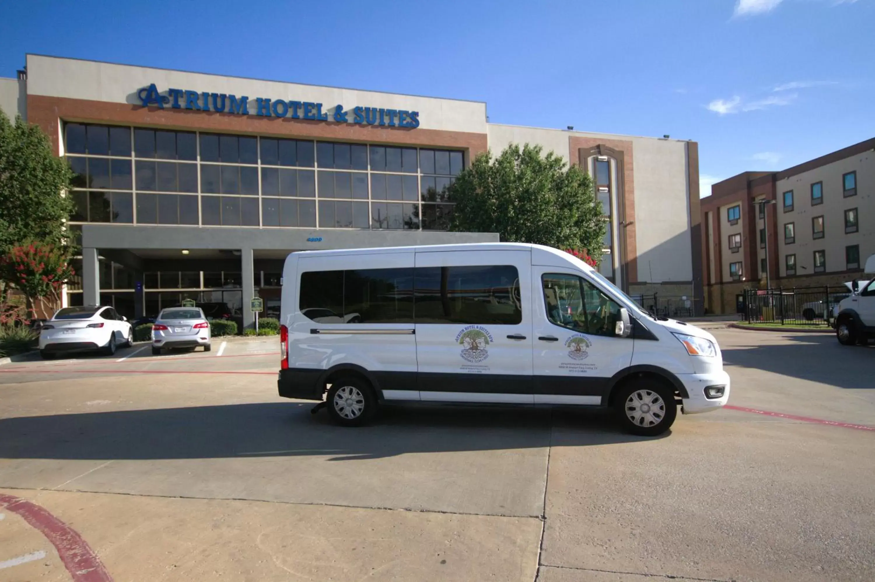 shuttle, Property Building in Atrium Hotel and Suites DFW Airport