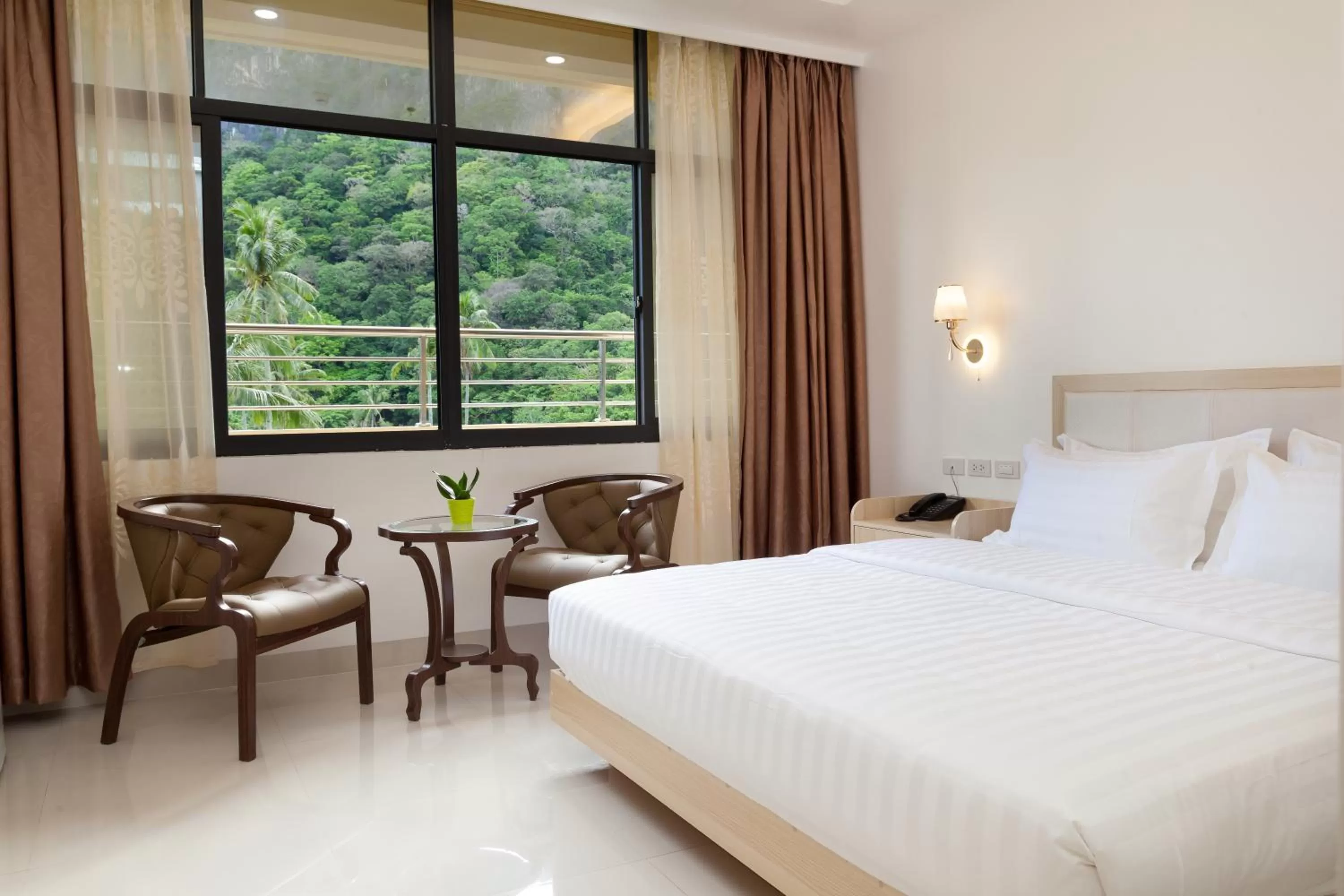 Seating area, Bed in One El Nido Suite