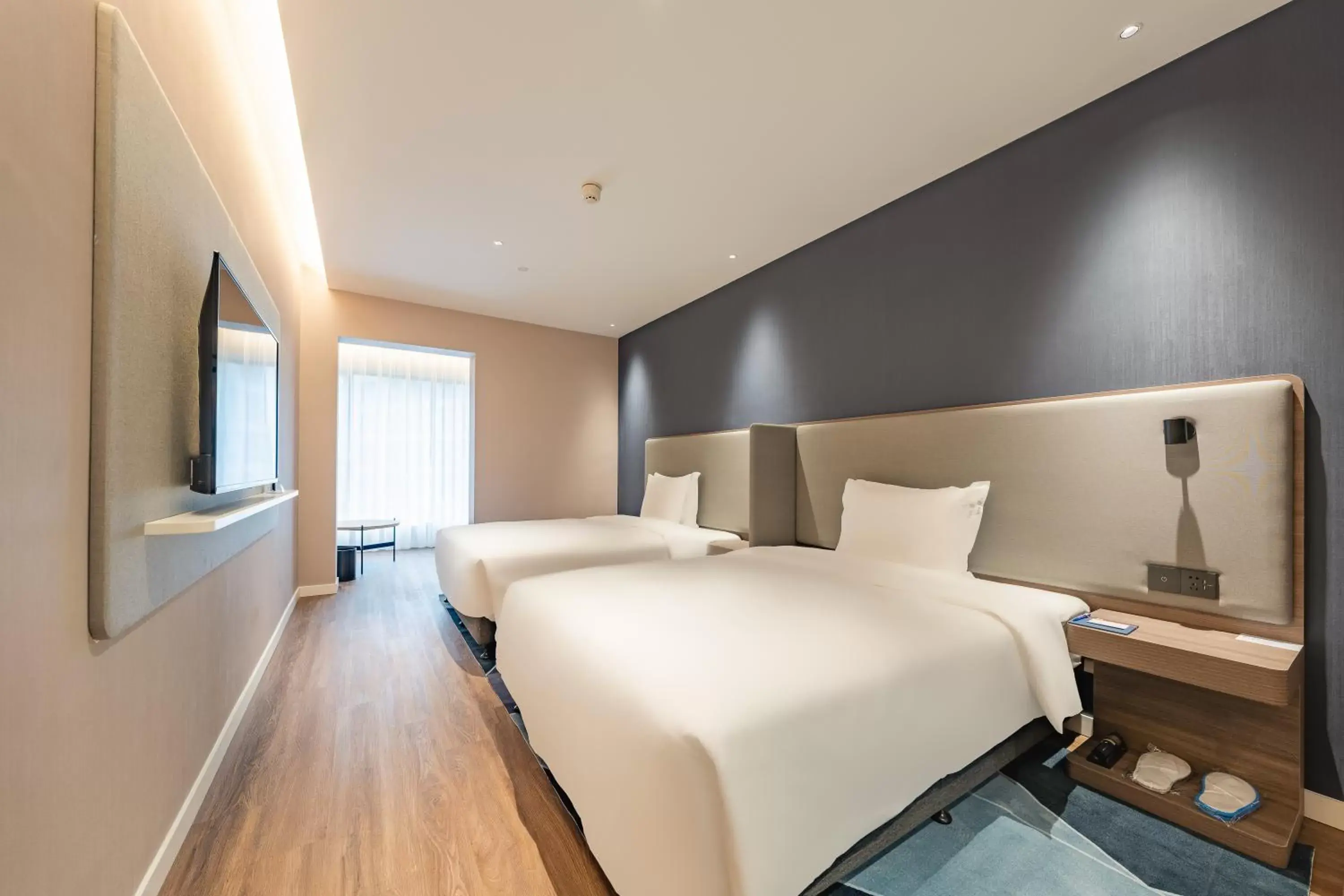 Bed in Holiday Inn Express Shanghai Expo Centre, an IHG Hotel