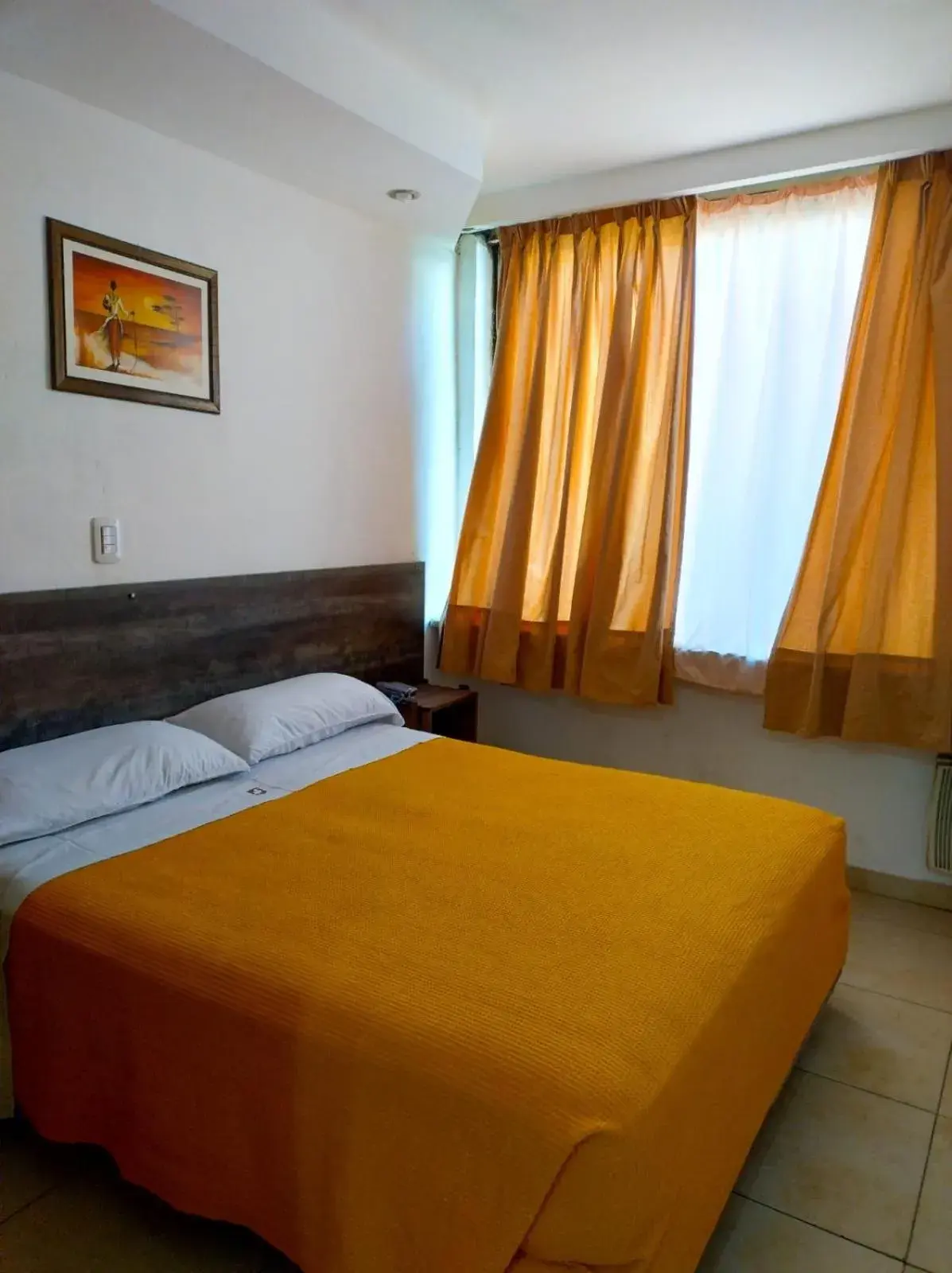 Bed in San Remo City Hotel