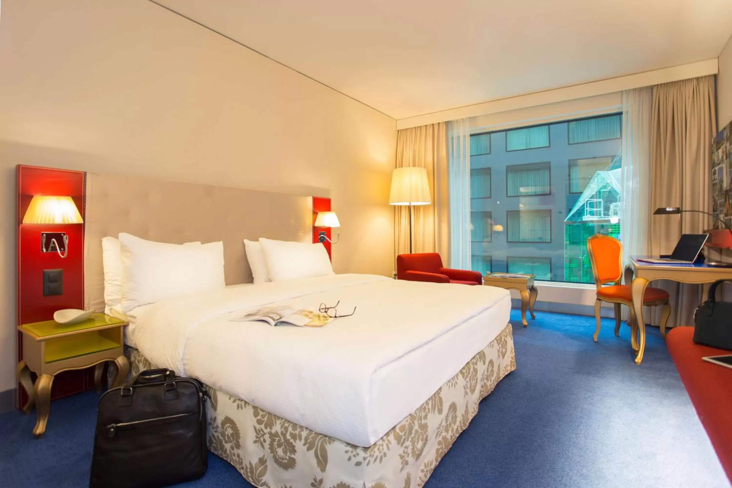 Photo of the whole room, Bed in Radisson Blu Hotel Zurich Airport