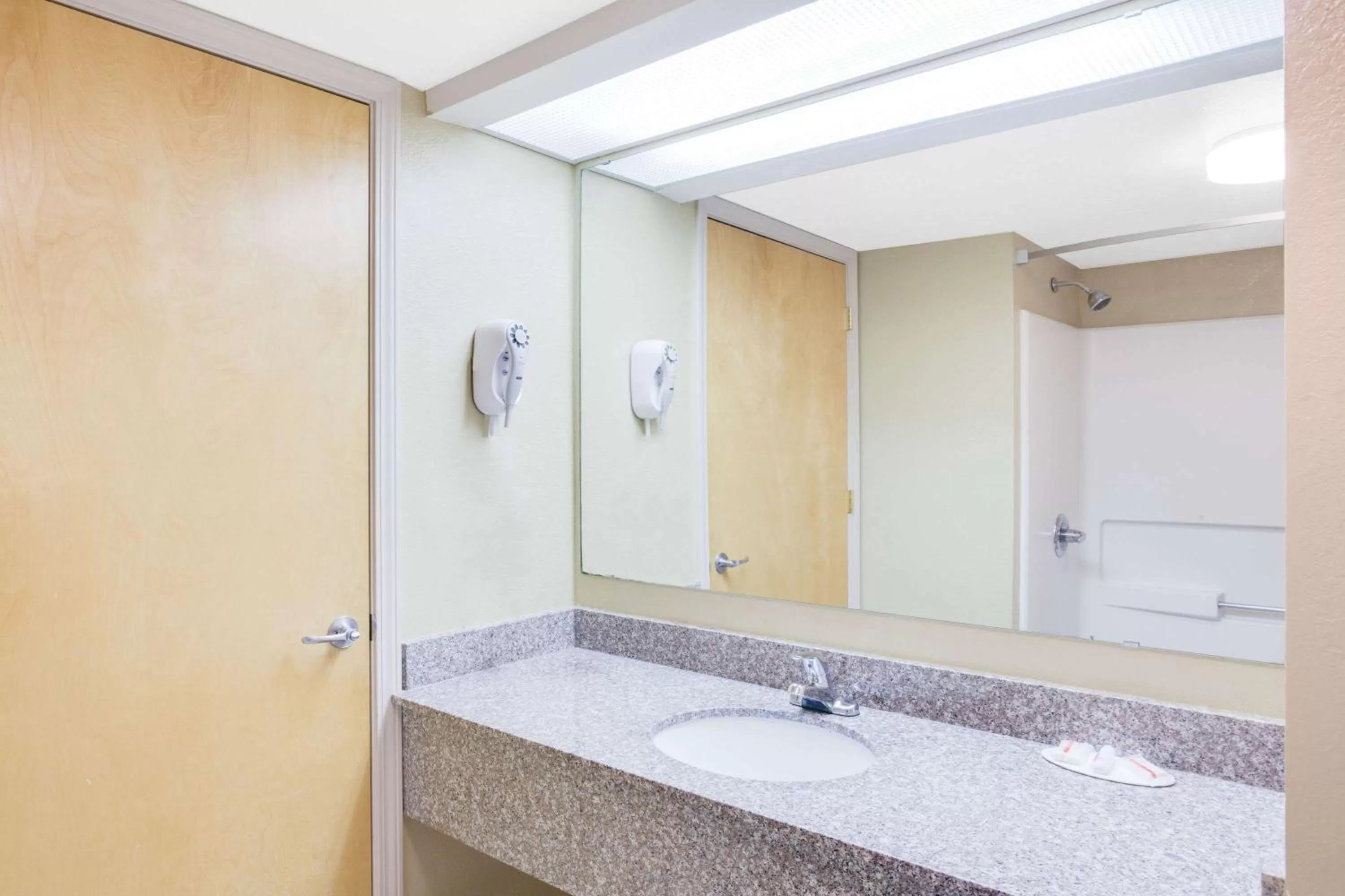 Bathroom in Super 8 by Wyndham Crossville TN