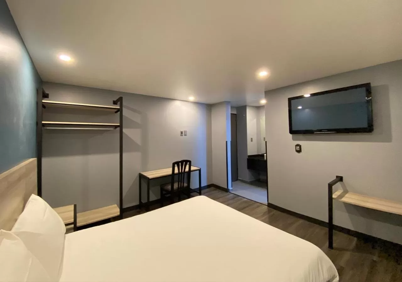 Photo of the whole room, Bed in Hotel Estrella de Oriente