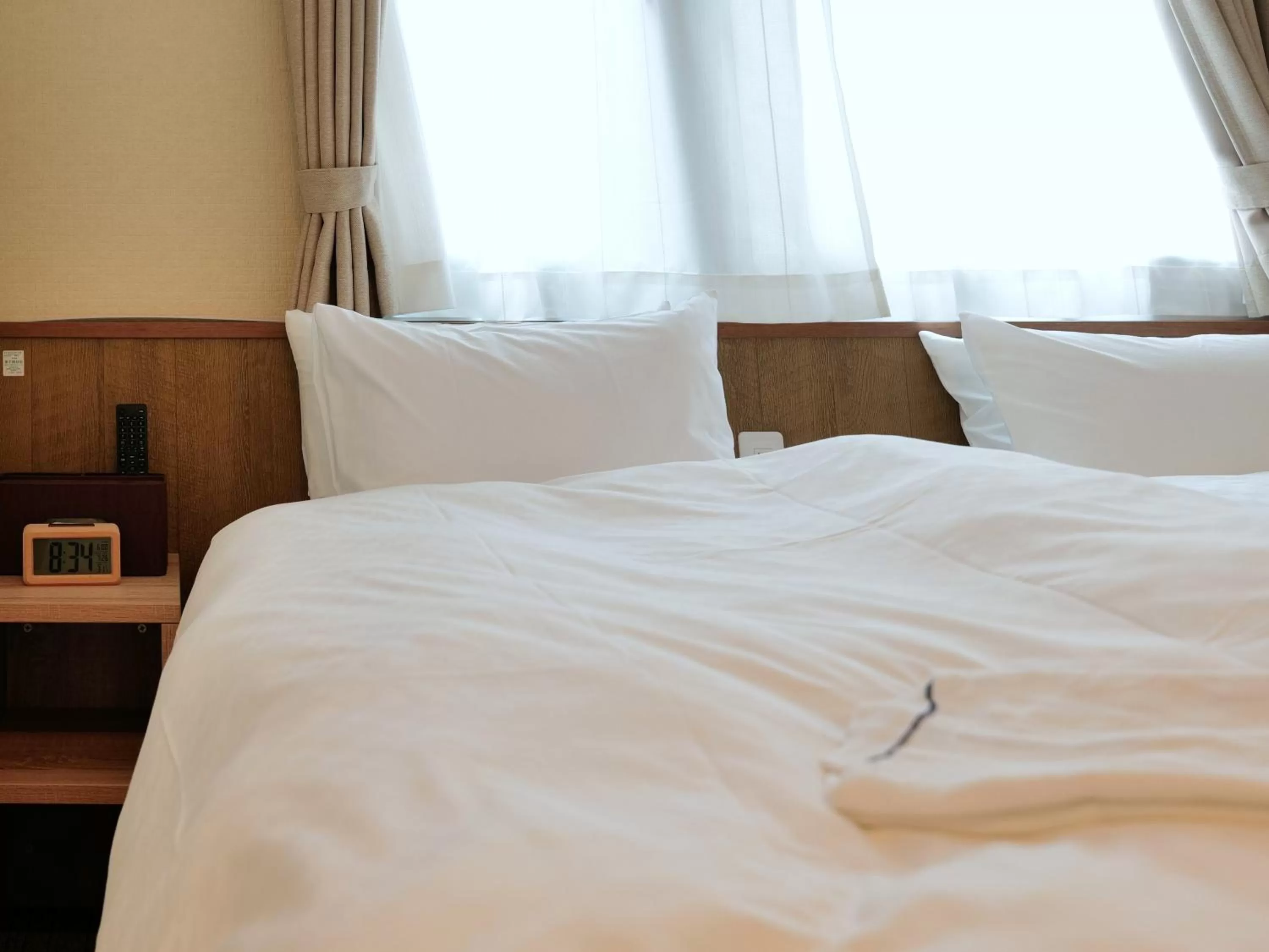Bed in Waka Kyoto Kawaramachi Hotel
