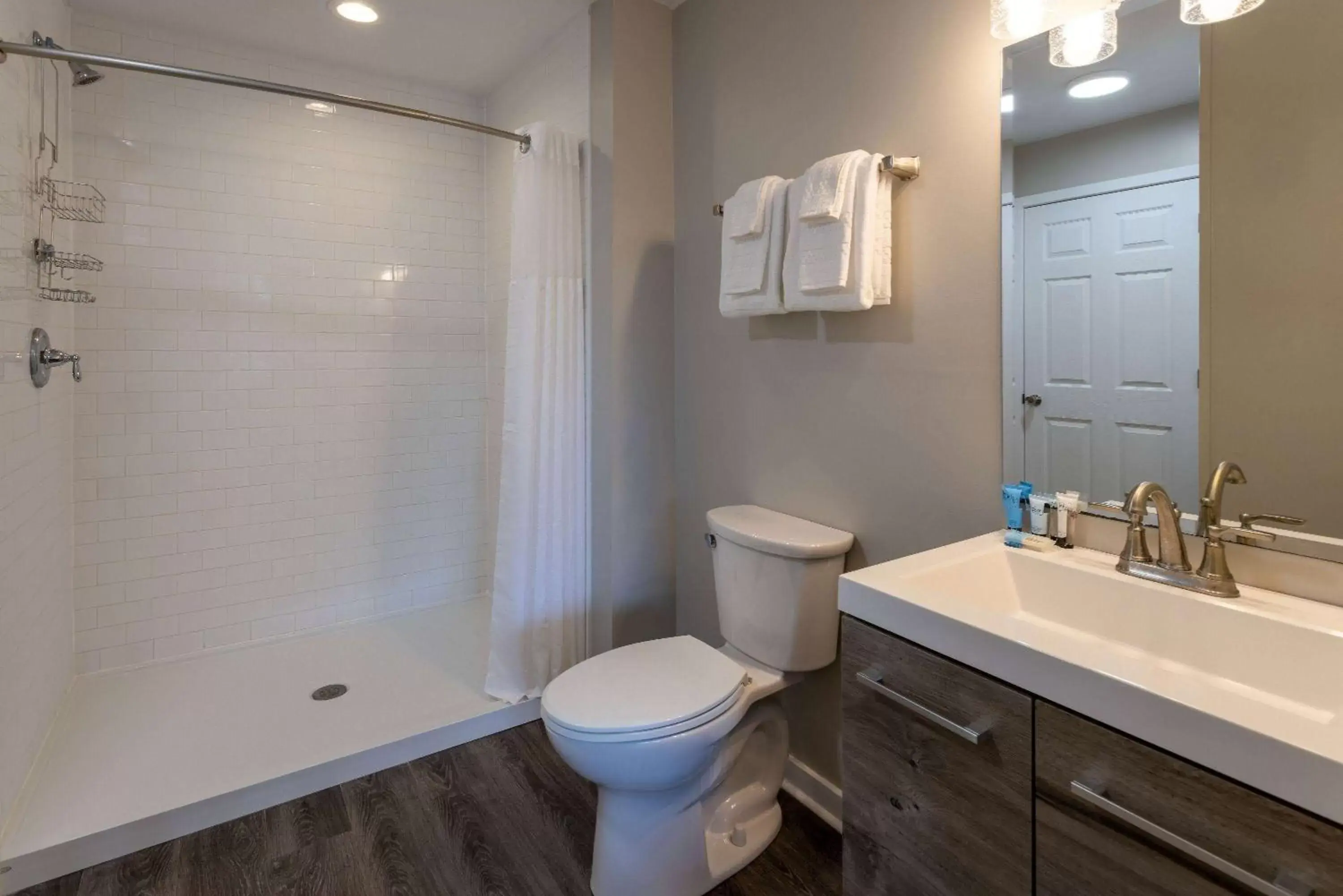 Bed, Bathroom in Atlantic Beach Resort, a Ramada by Wyndham