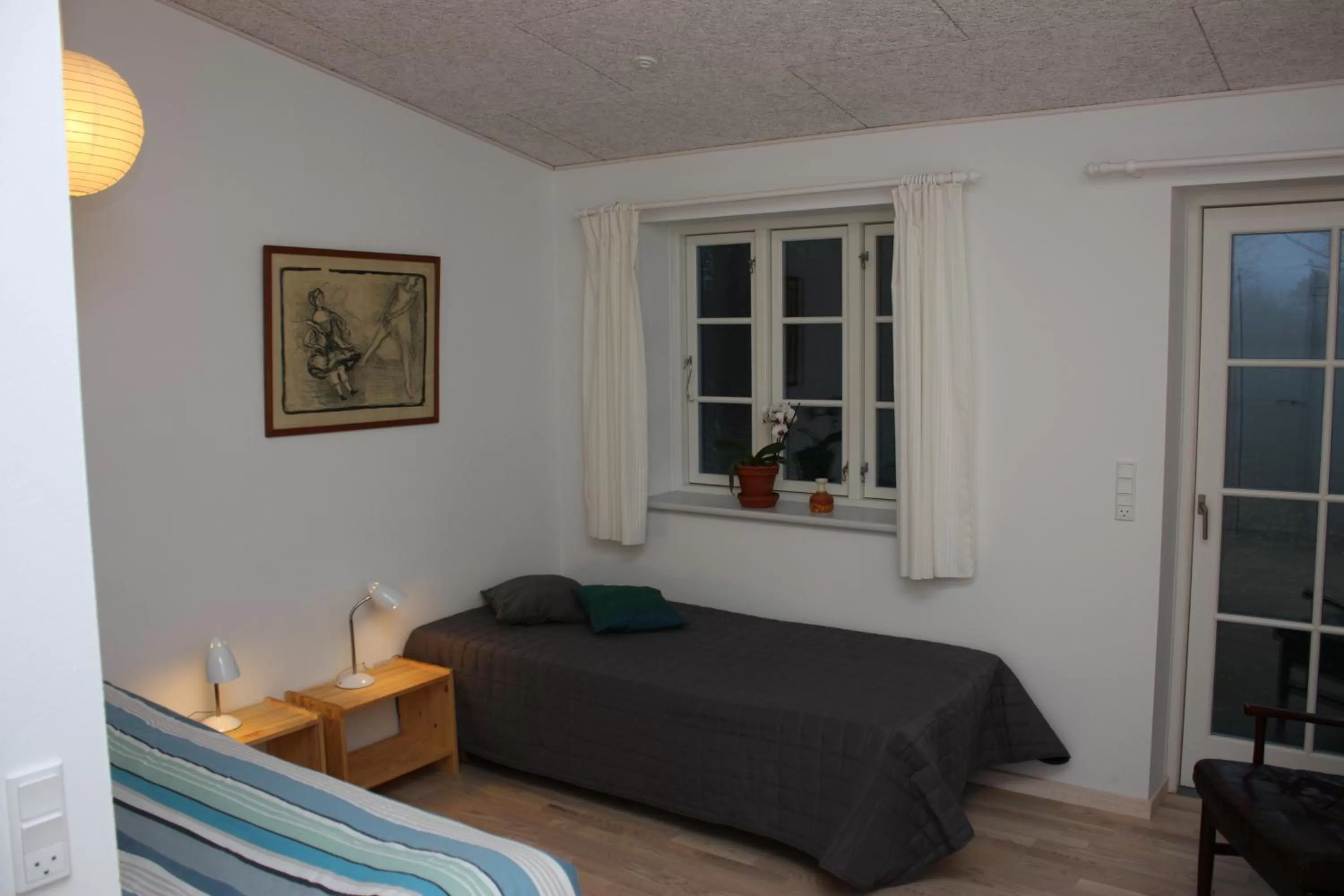 Bed in Holmehuset Bed & Breakfast