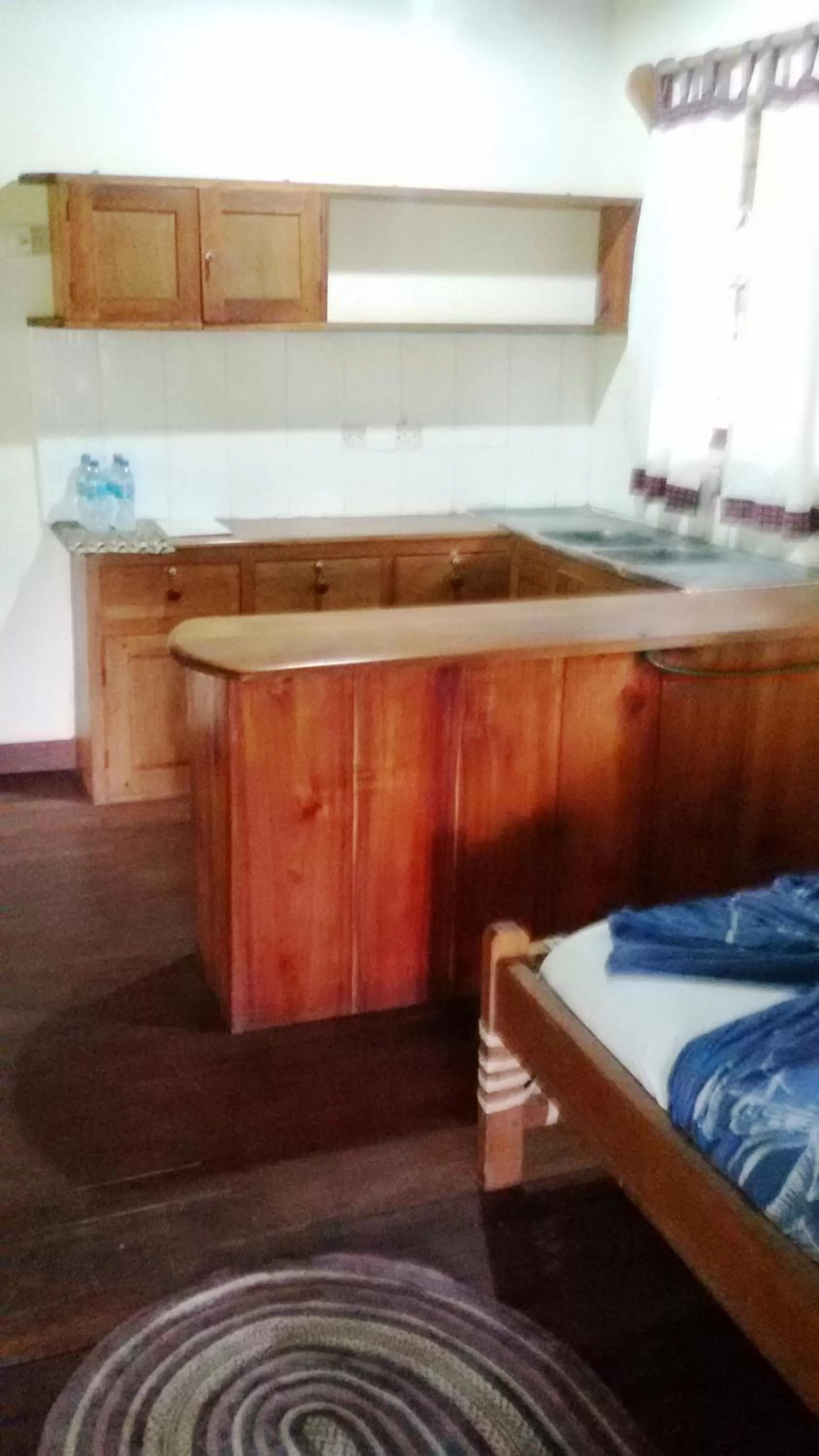Kitchen or kitchenette, Bed in Bahari Pori Resort
