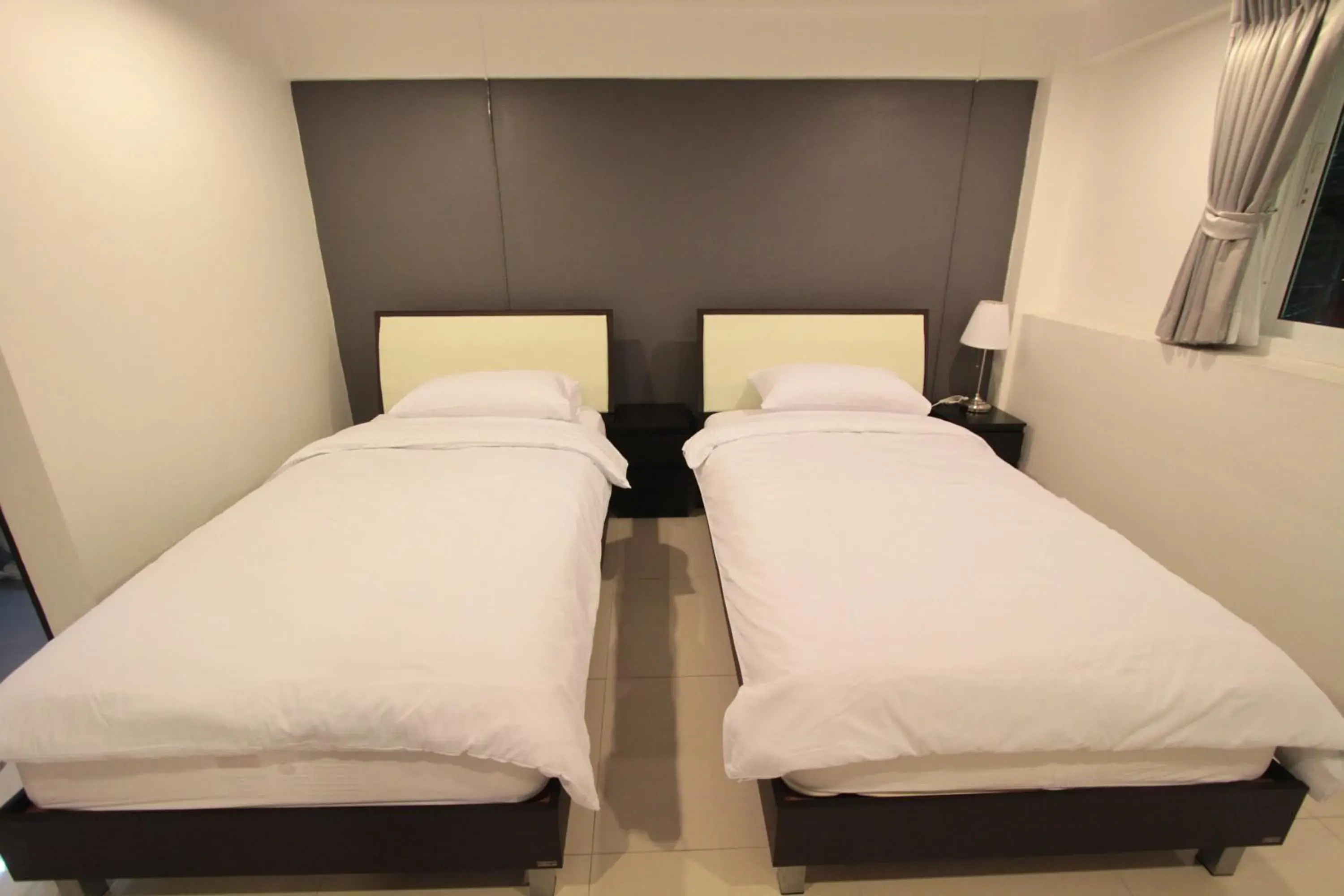 Bed in Napaville Huai Khwang Hostel