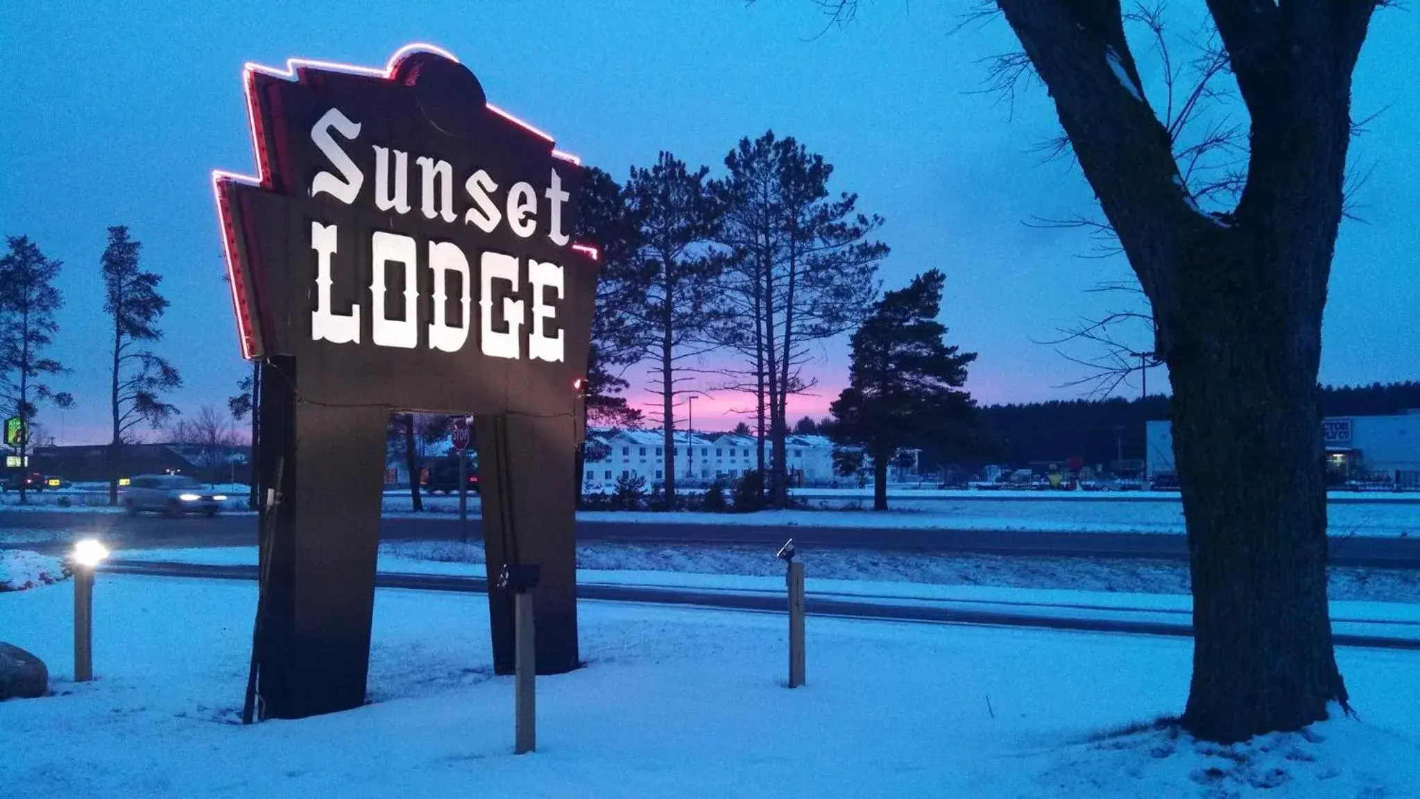 Property logo or sign, Winter in Sunset Lodge Escanaba