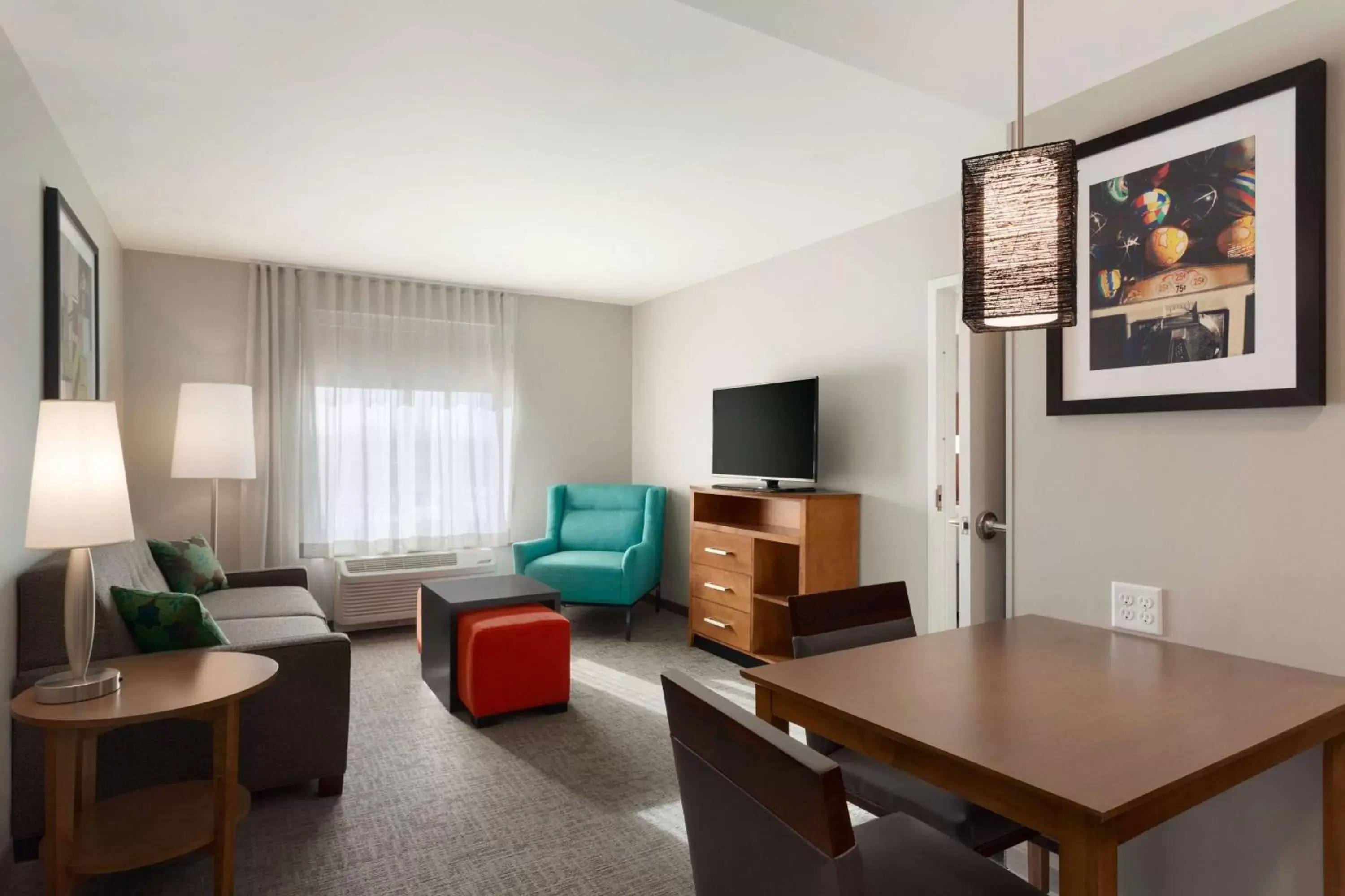 Living room, Seating Area in Homewood Suites by Hilton Syracuse - Carrier Circle