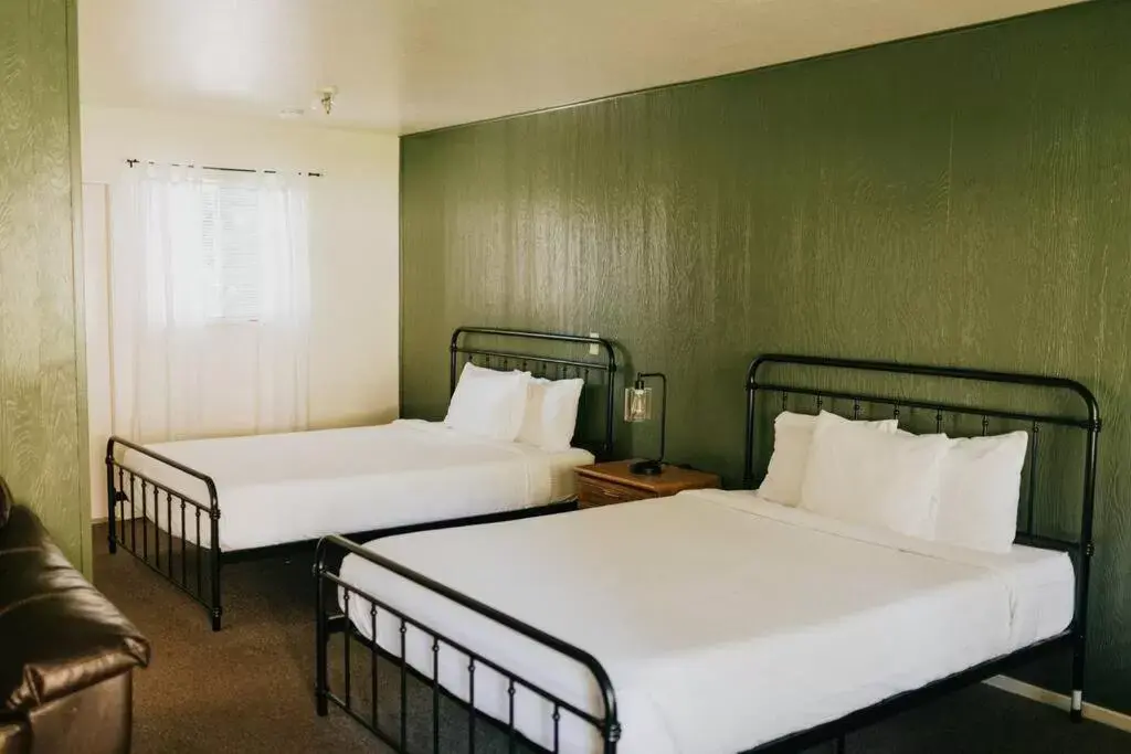 Bed in The Long Barn Lodge