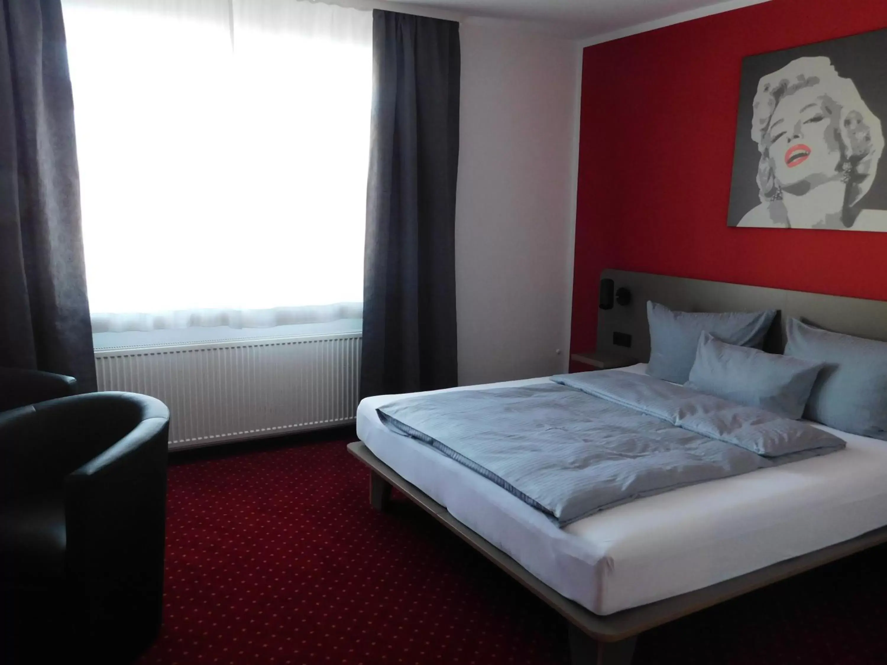 Bed in Hotel KonradP Holzkirchen