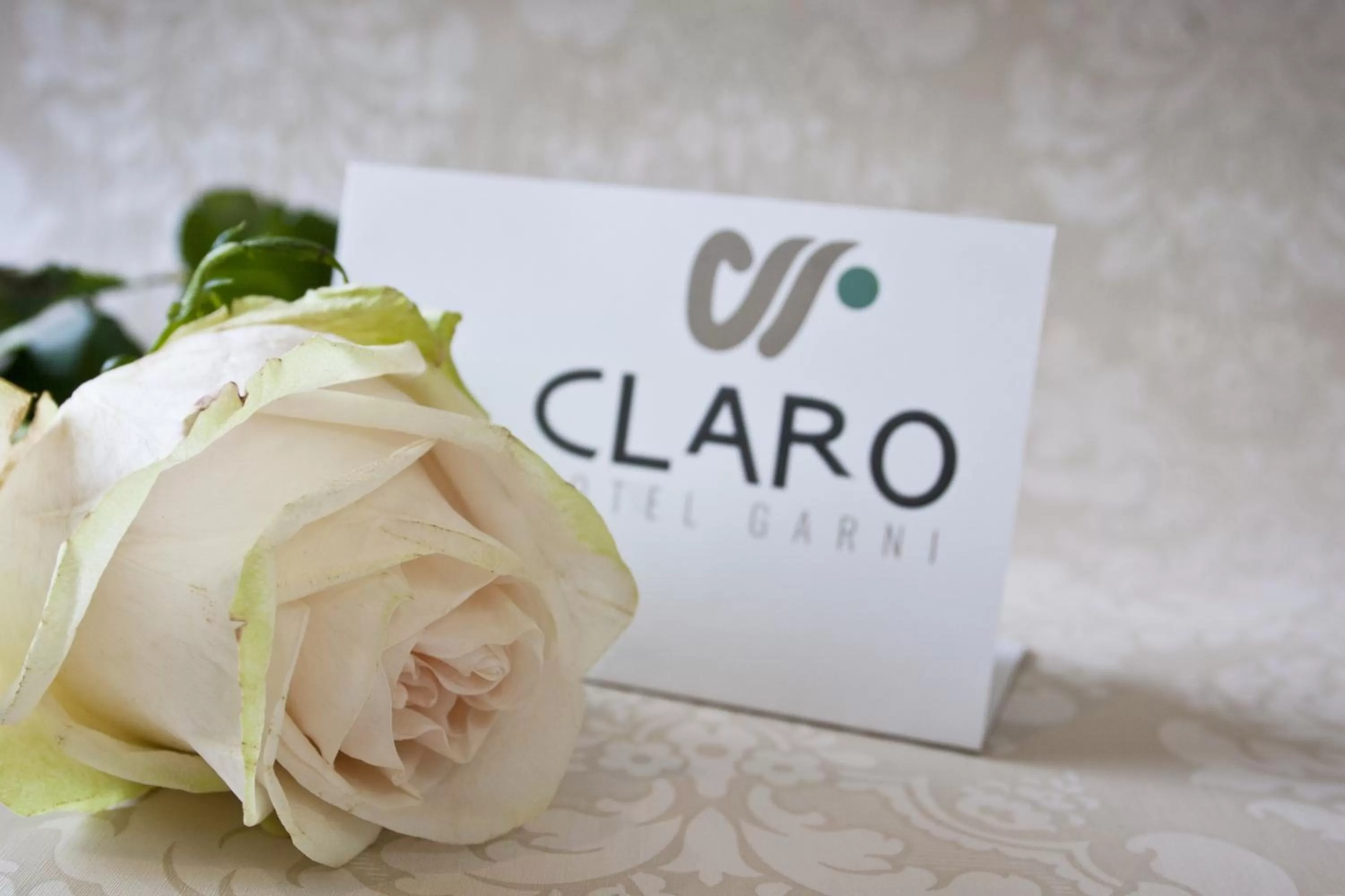 Property logo or sign in Hotel Claro Garni