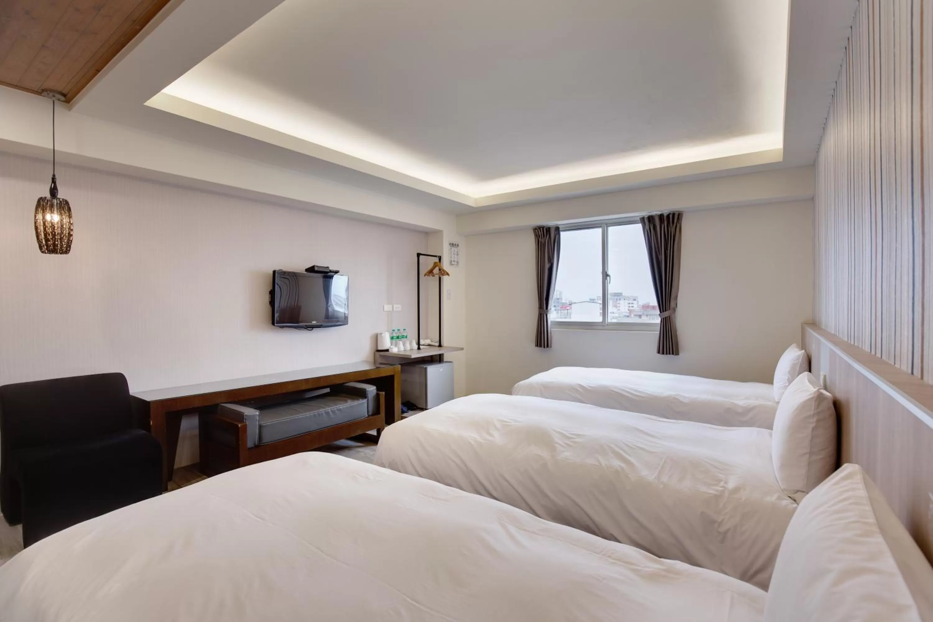 Bed in 天璽商務飯店 Cullinan Hotel
