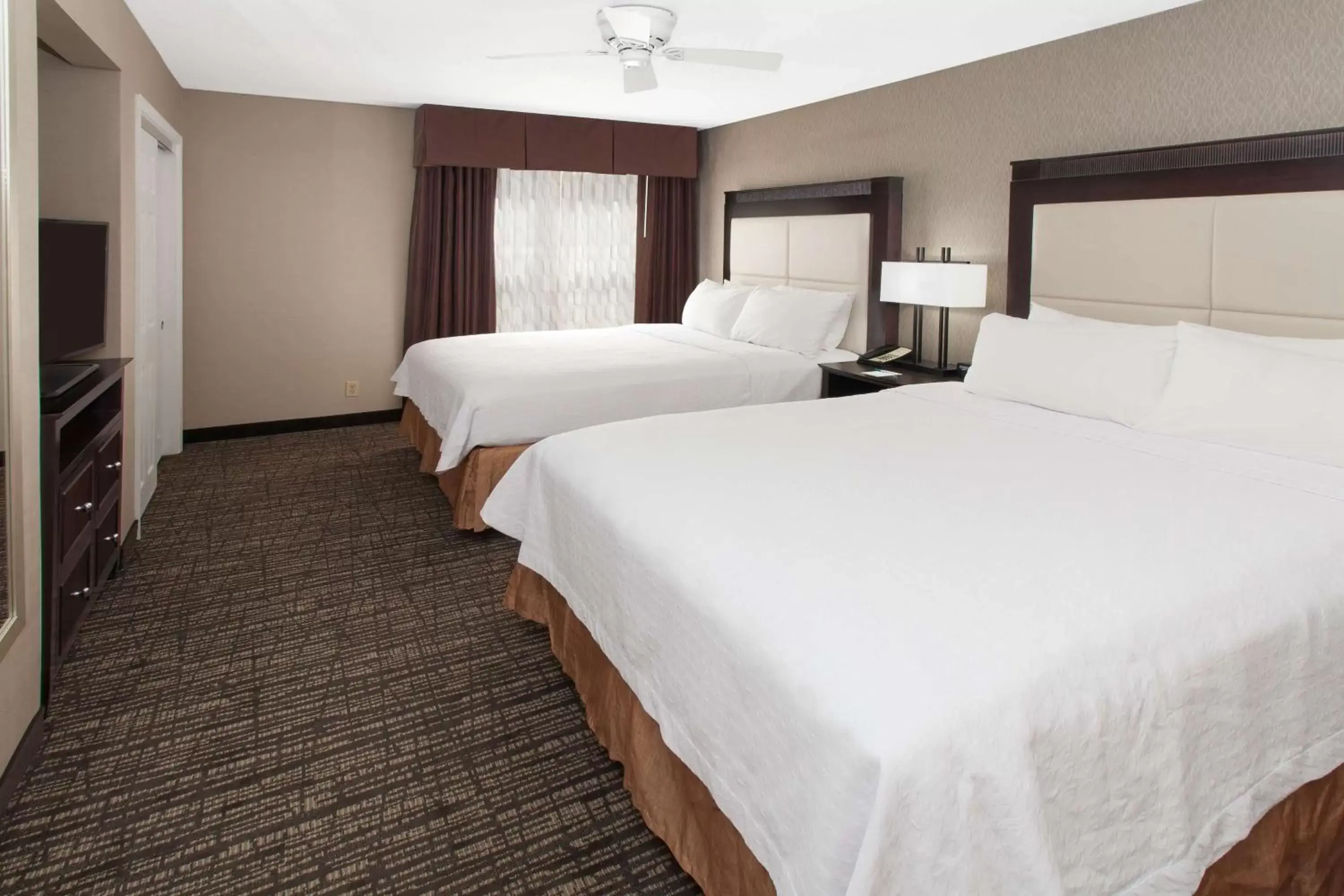 Bed in Homewood Suites by Hilton Indianapolis At The Crossing