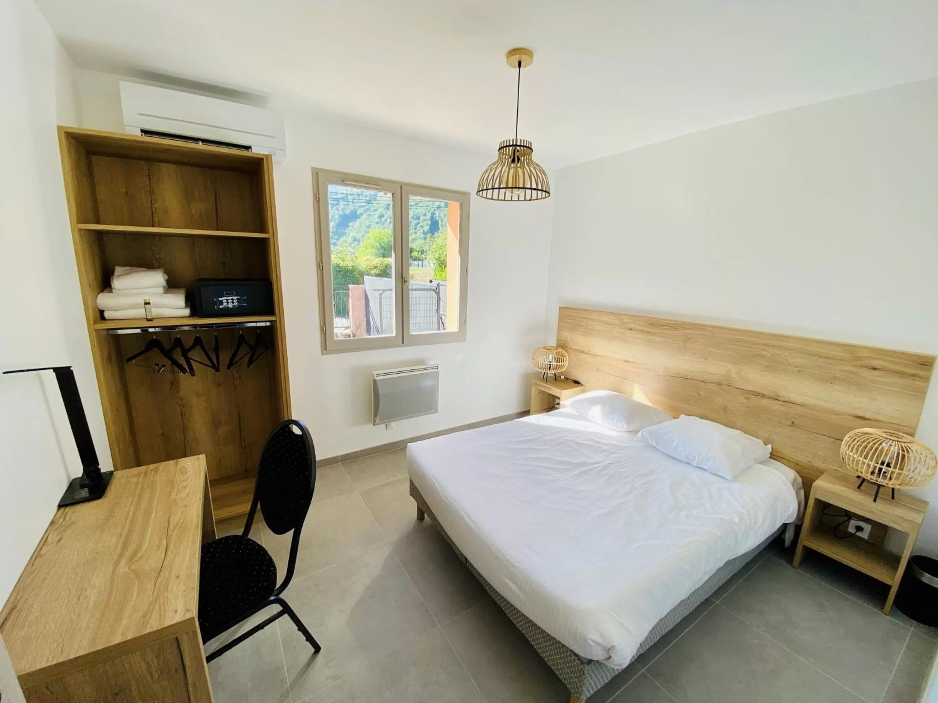 Bed in Les Villas du Domaine de Suzel