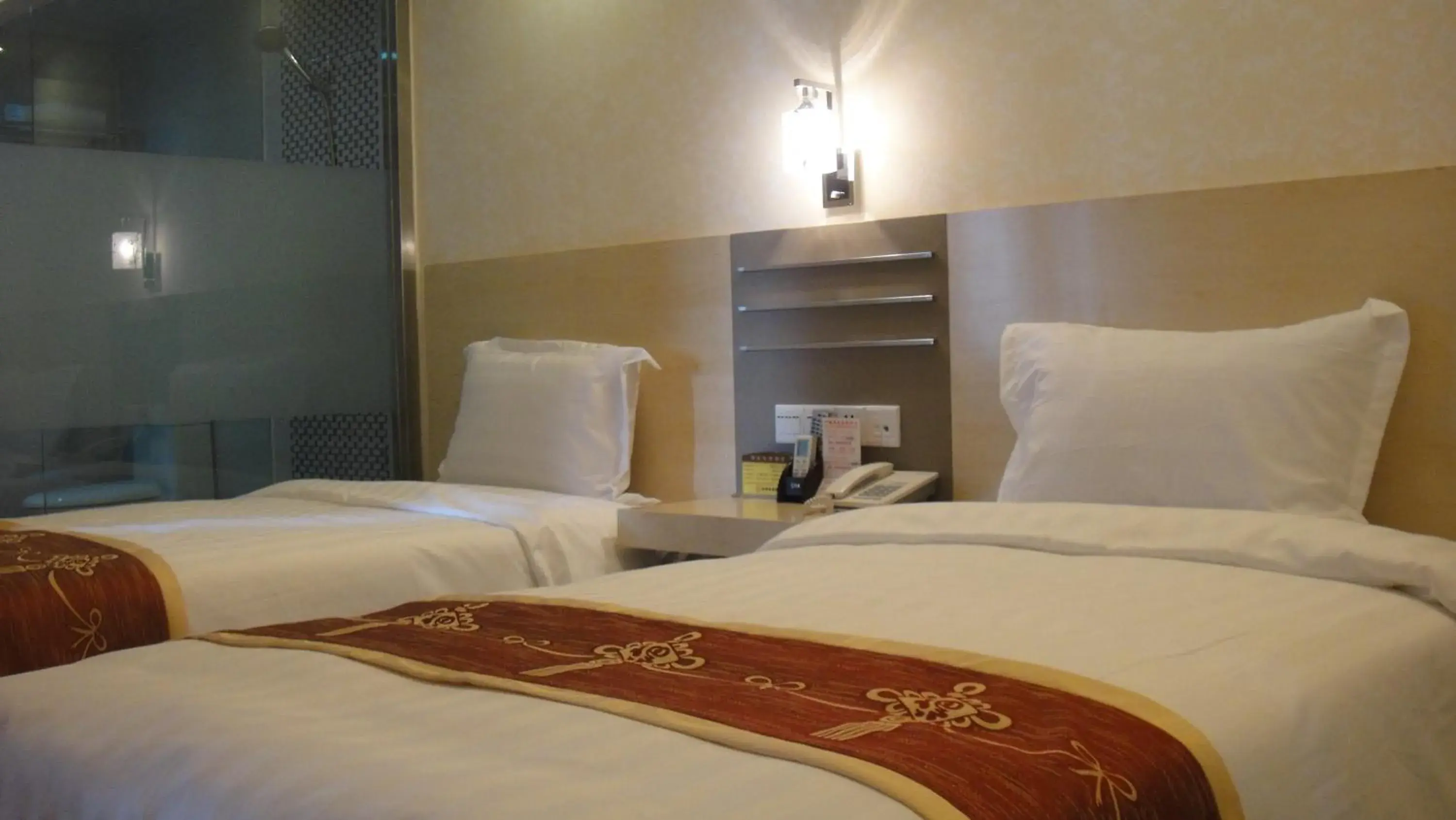 Bed in Guang Dong Hotel