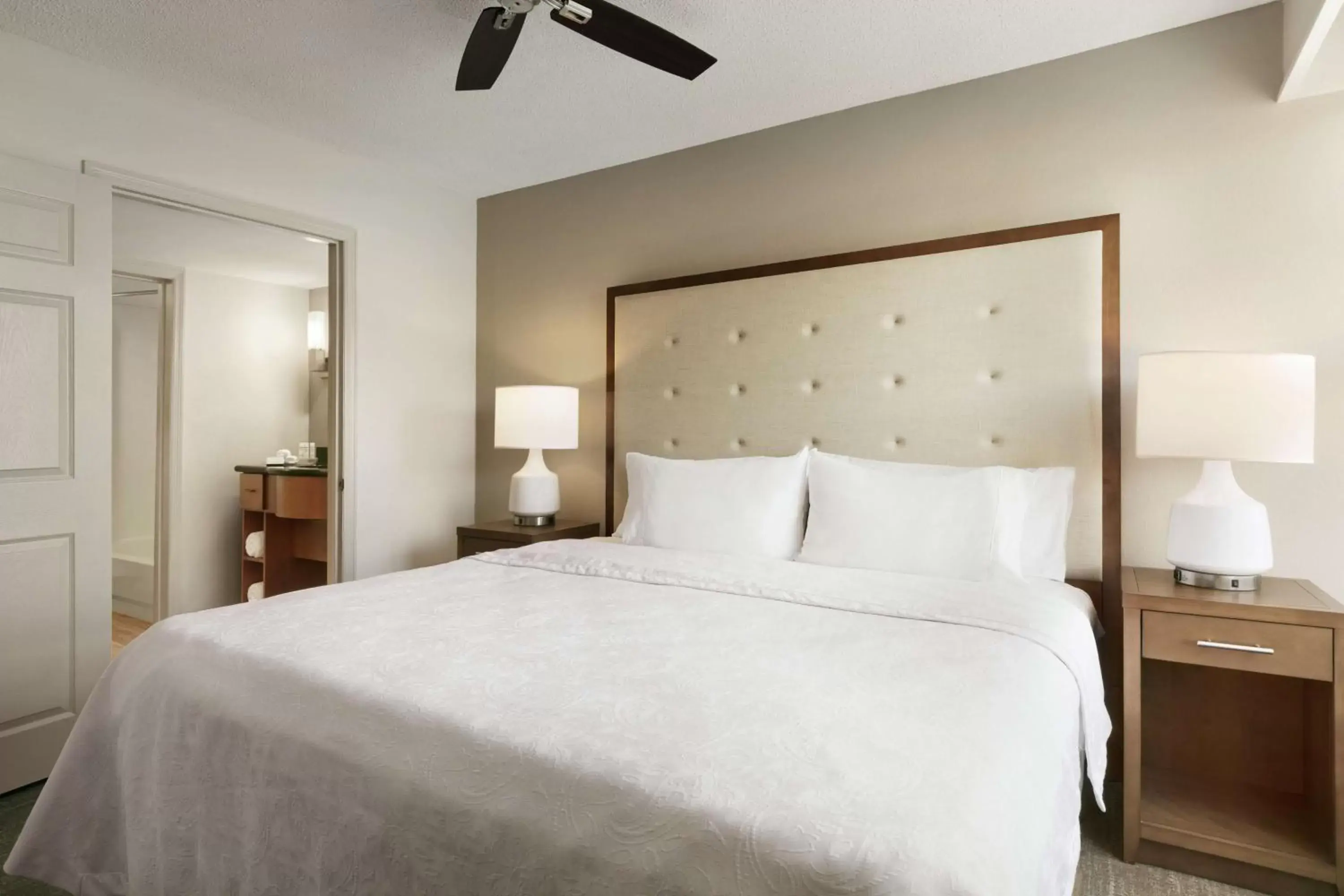 Bed in Homewood Suites by Hilton Kansas City Airport