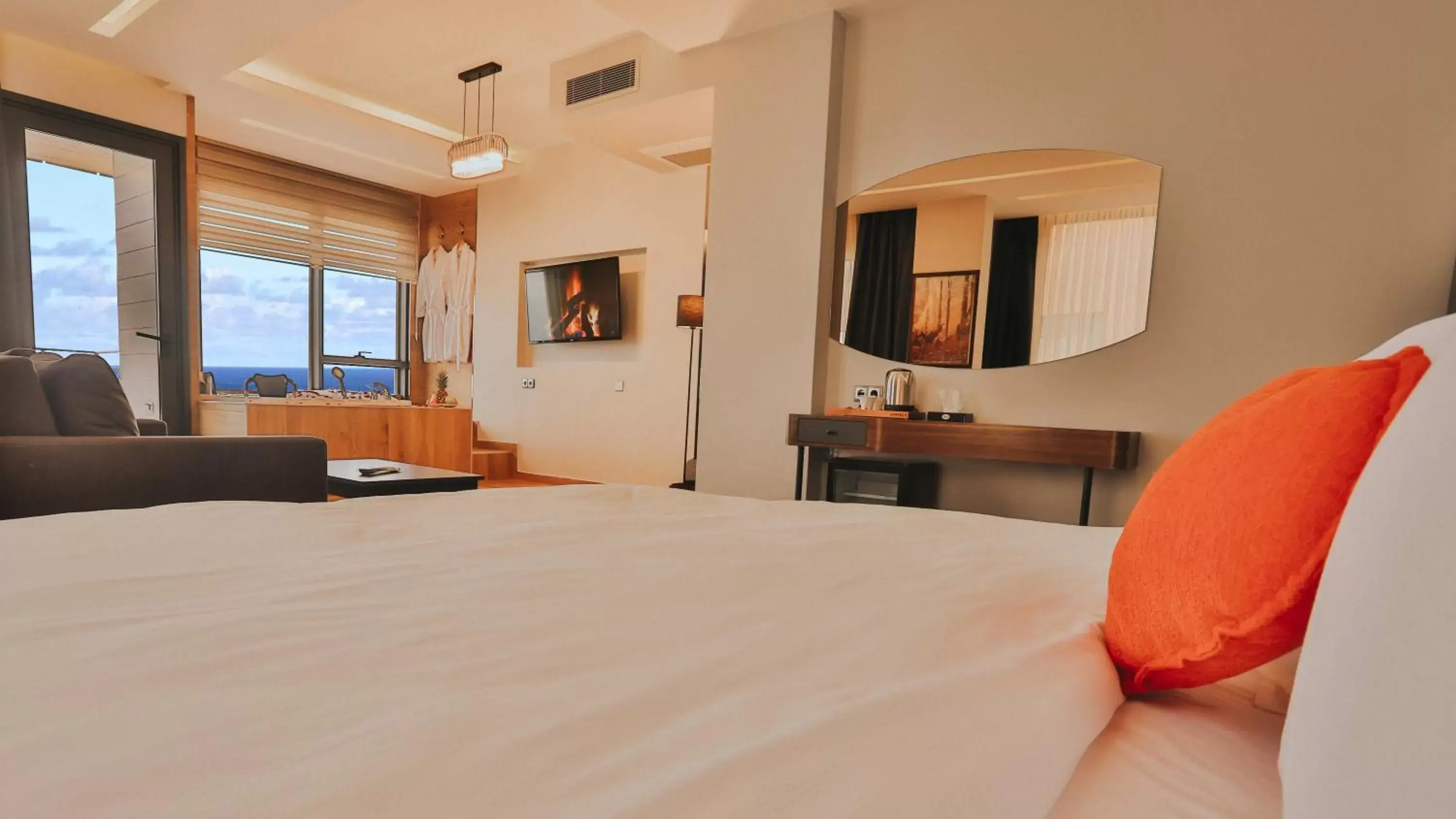 Bed in Peerless Villas Hotel