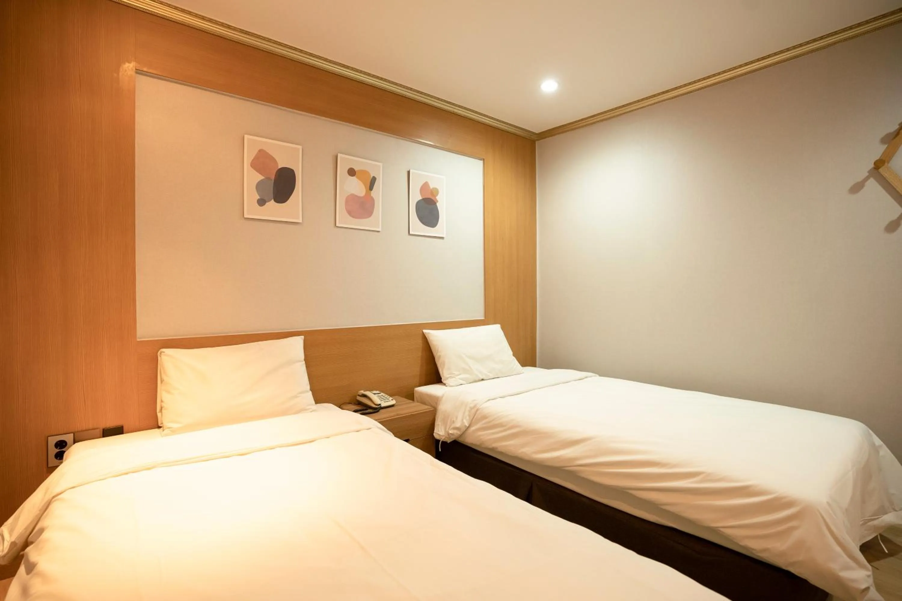 Bed in Jeju Stay Hotel