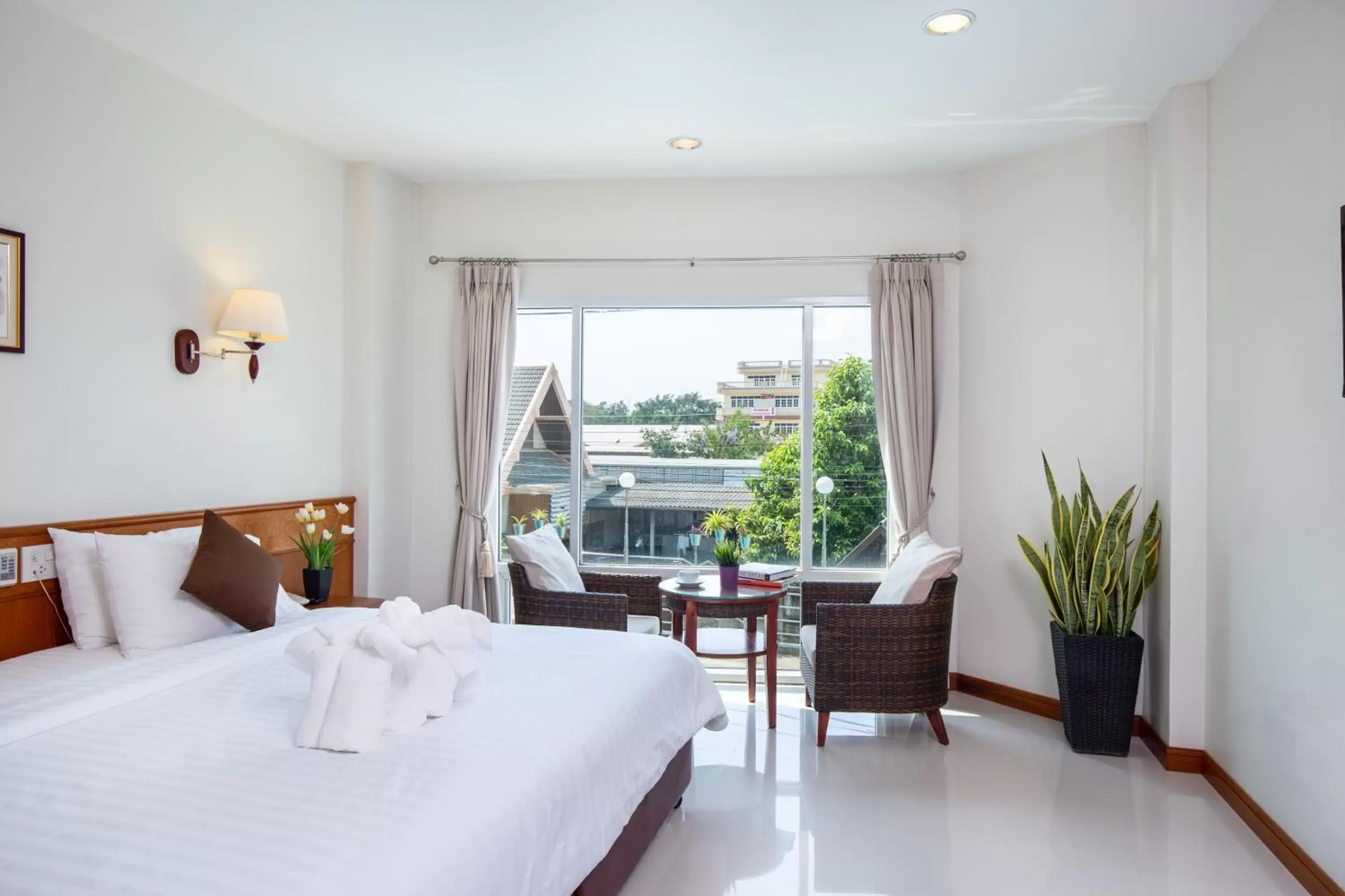 Bed in Kanchanaburi City Hotel - SHA Extra Plus