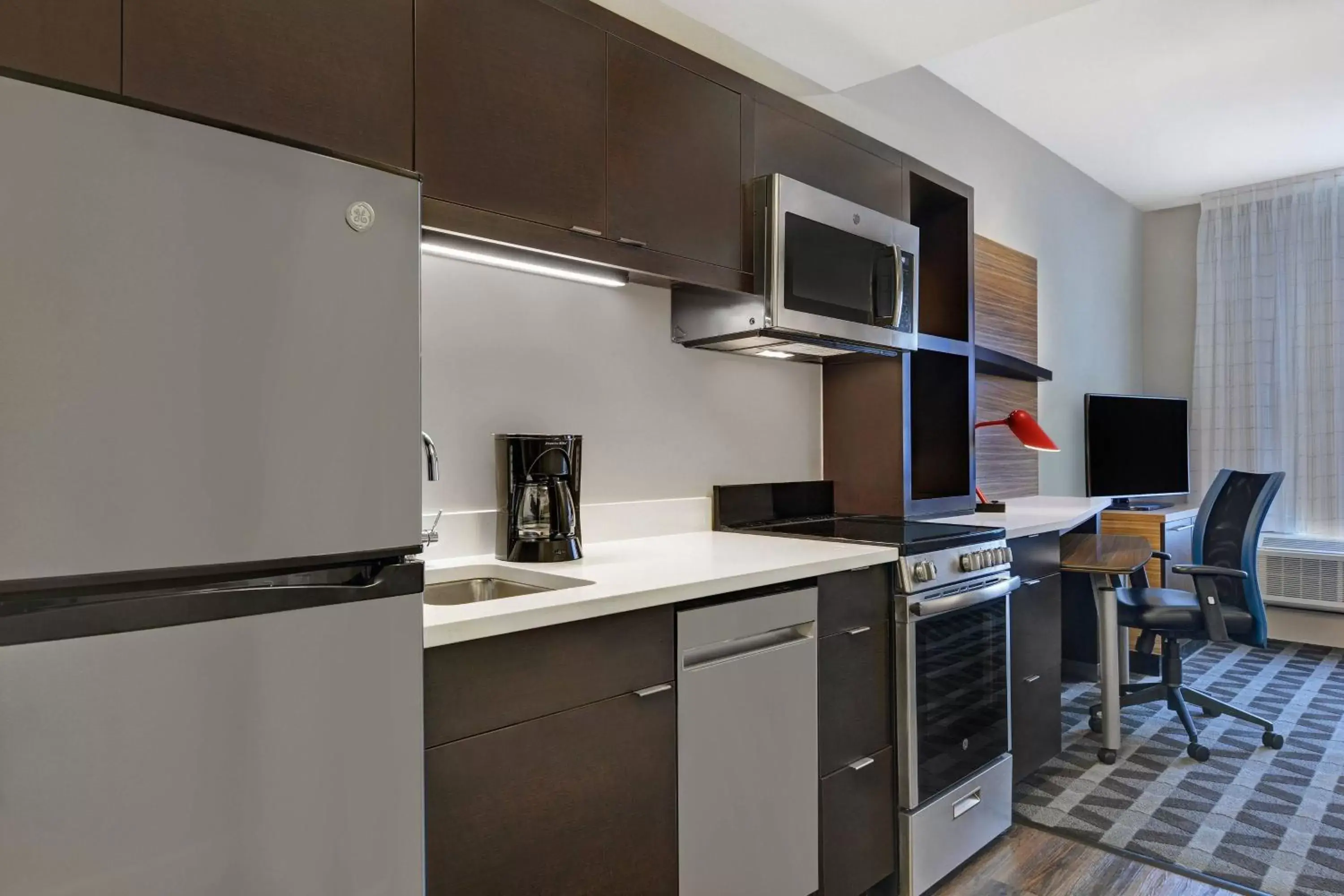 Bedroom, Kitchen/Kitchenette in TownePlace Suites by Marriott Sarasota/Bradenton West