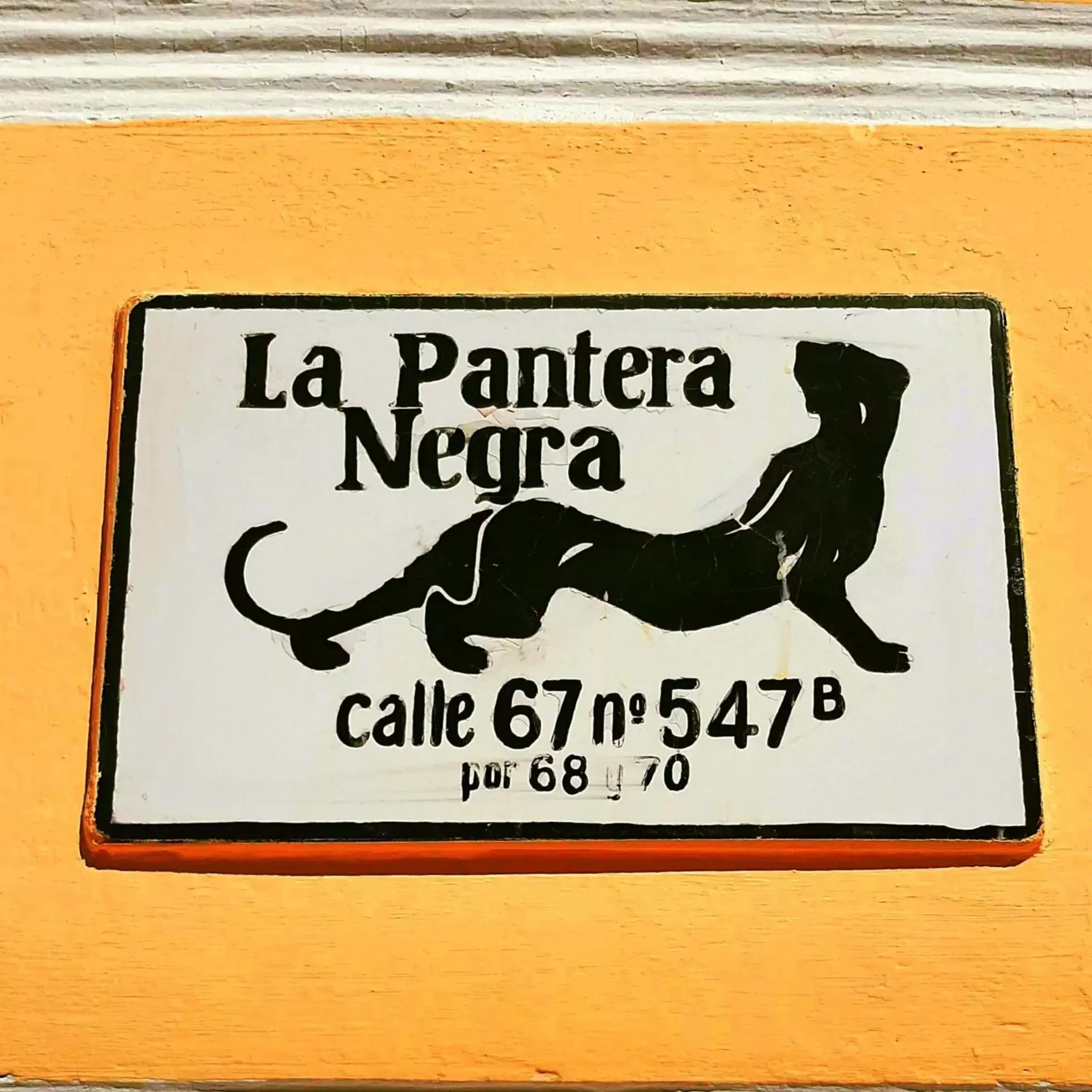 Property logo or sign in La Pantera Negra