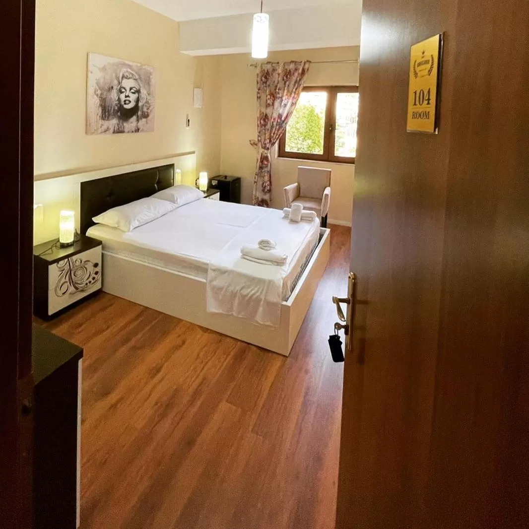 Bed in Hotel Ambasador Garden