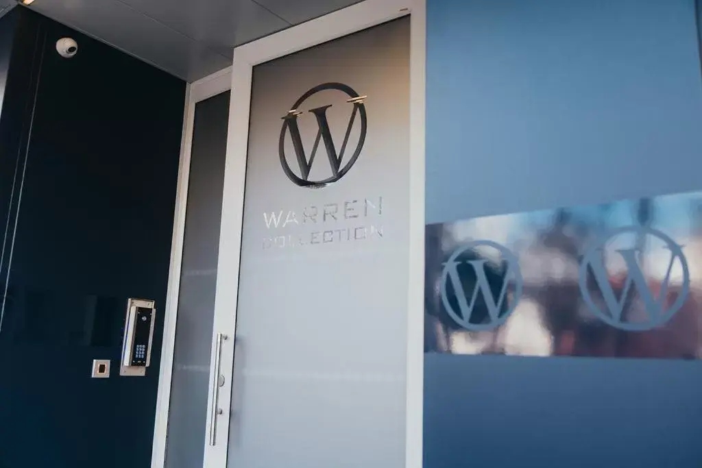 Property Logo/Sign in Quarter by the Warren Collection