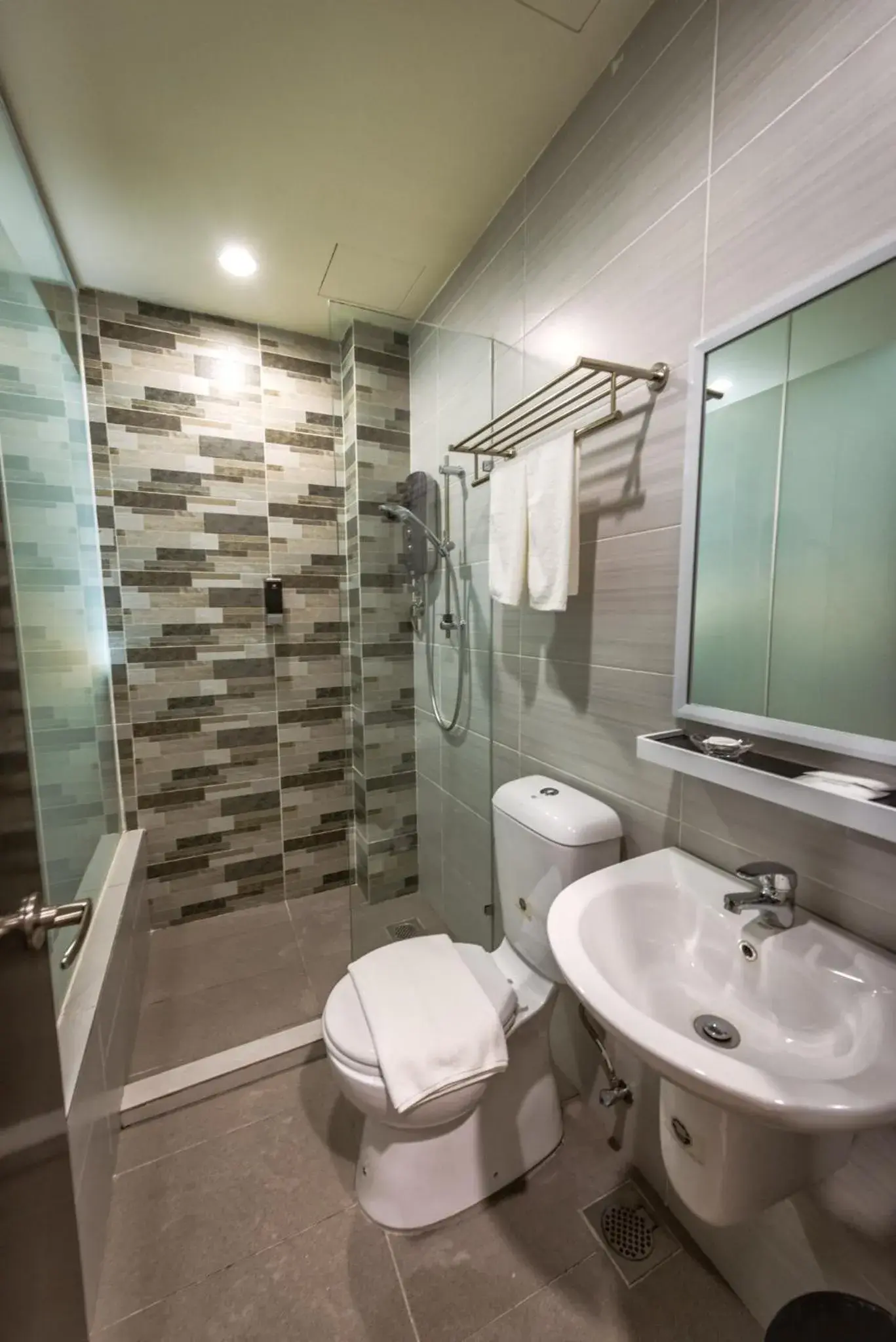 Shower, Bathroom in BIG M Hotel