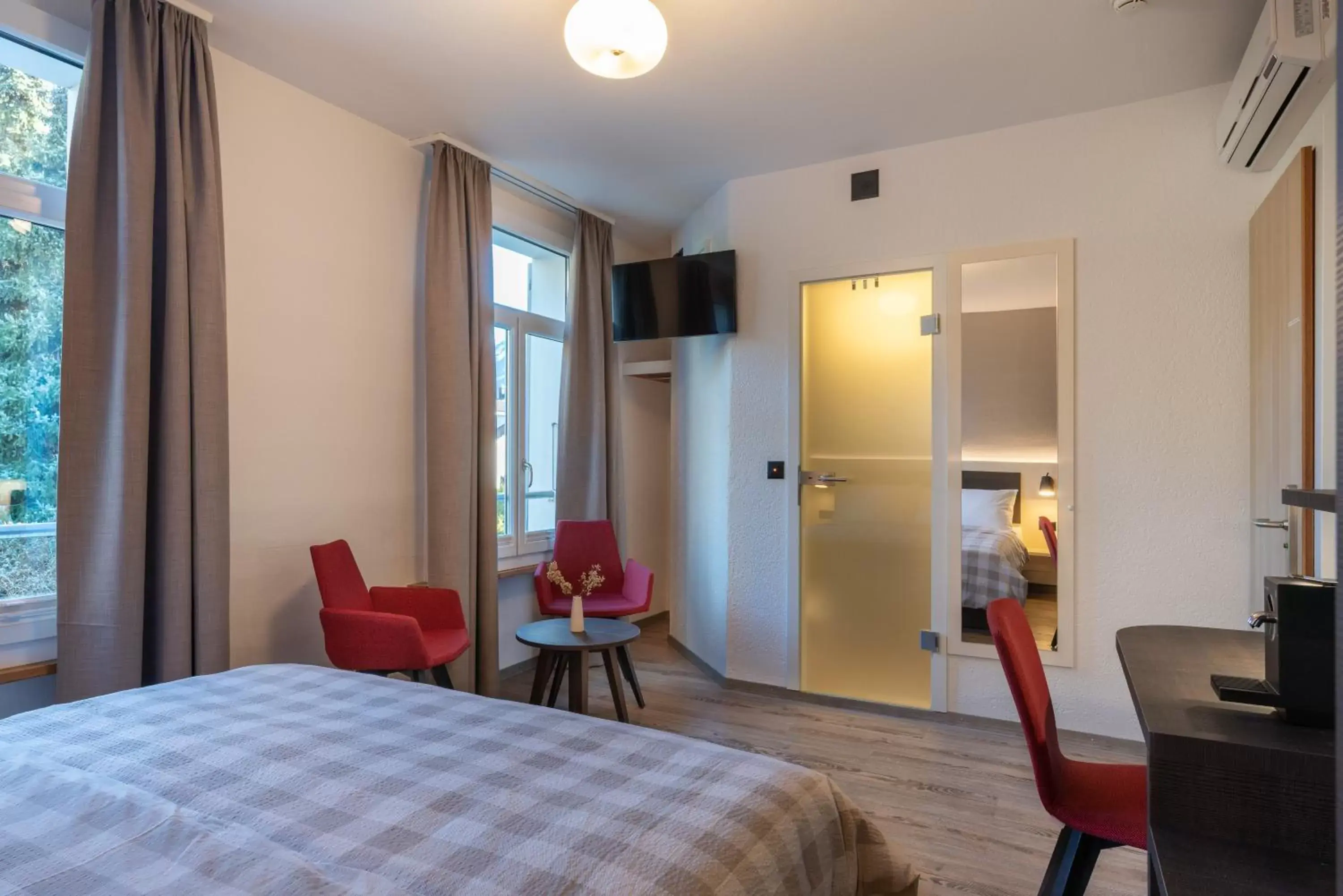 Bedroom in Hotel Derby Interlaken - Action & Relax Hub