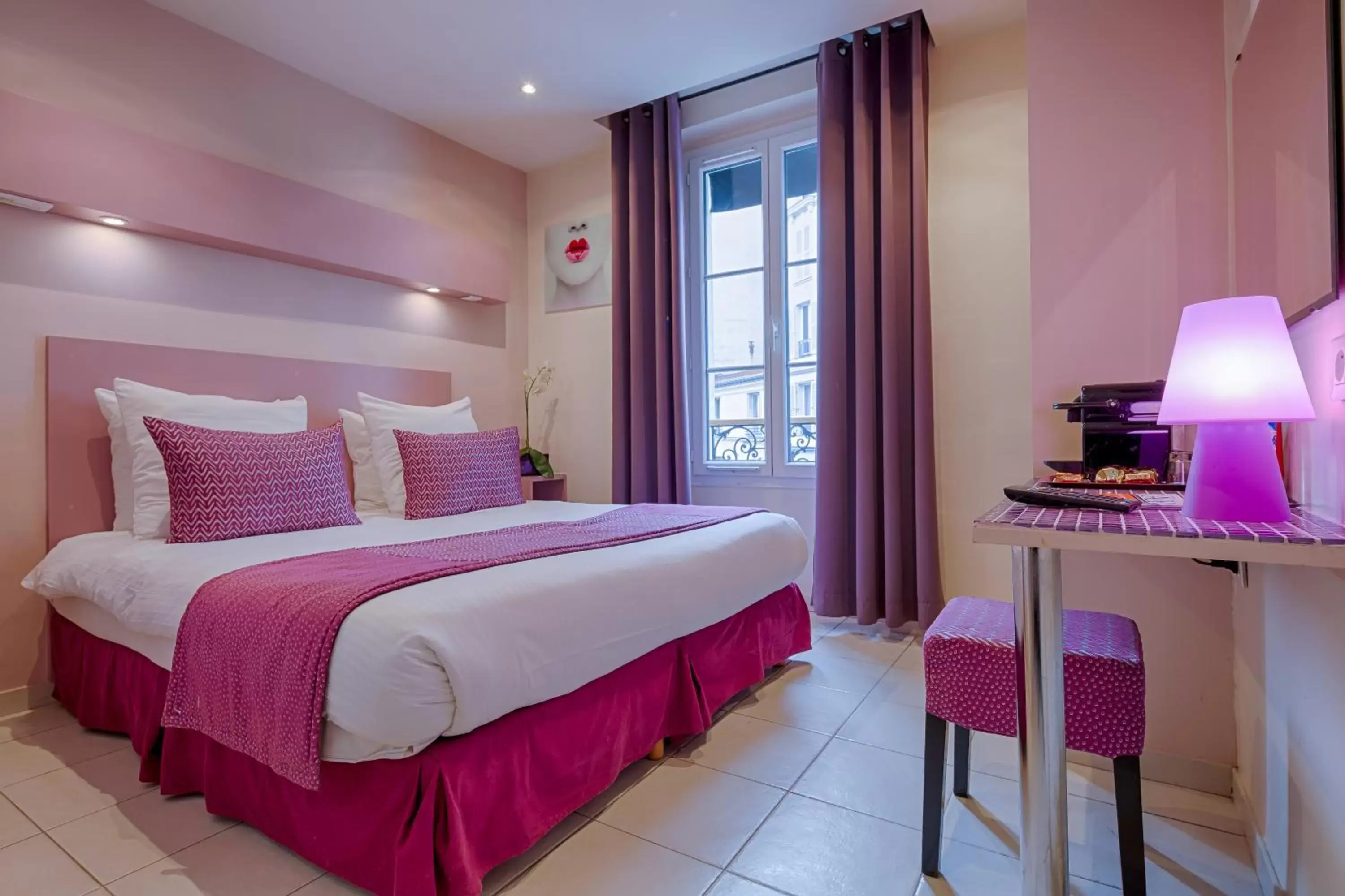 Bed in Pink Hotel