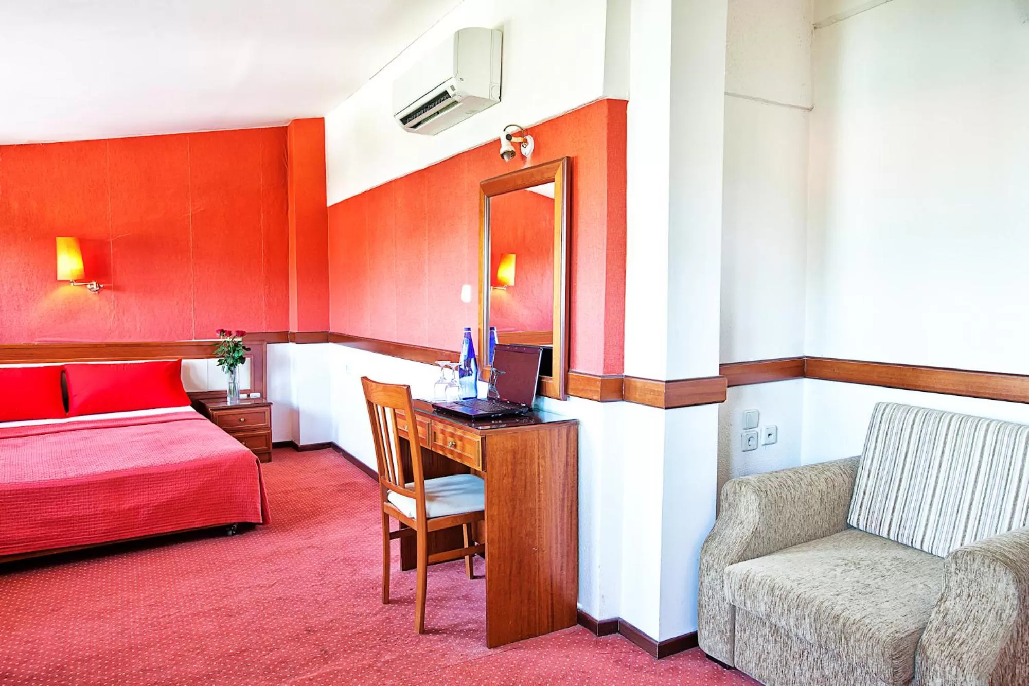 Property building, Bed in Anastassiou Hotel - Bike and motorcycle friendly hotel